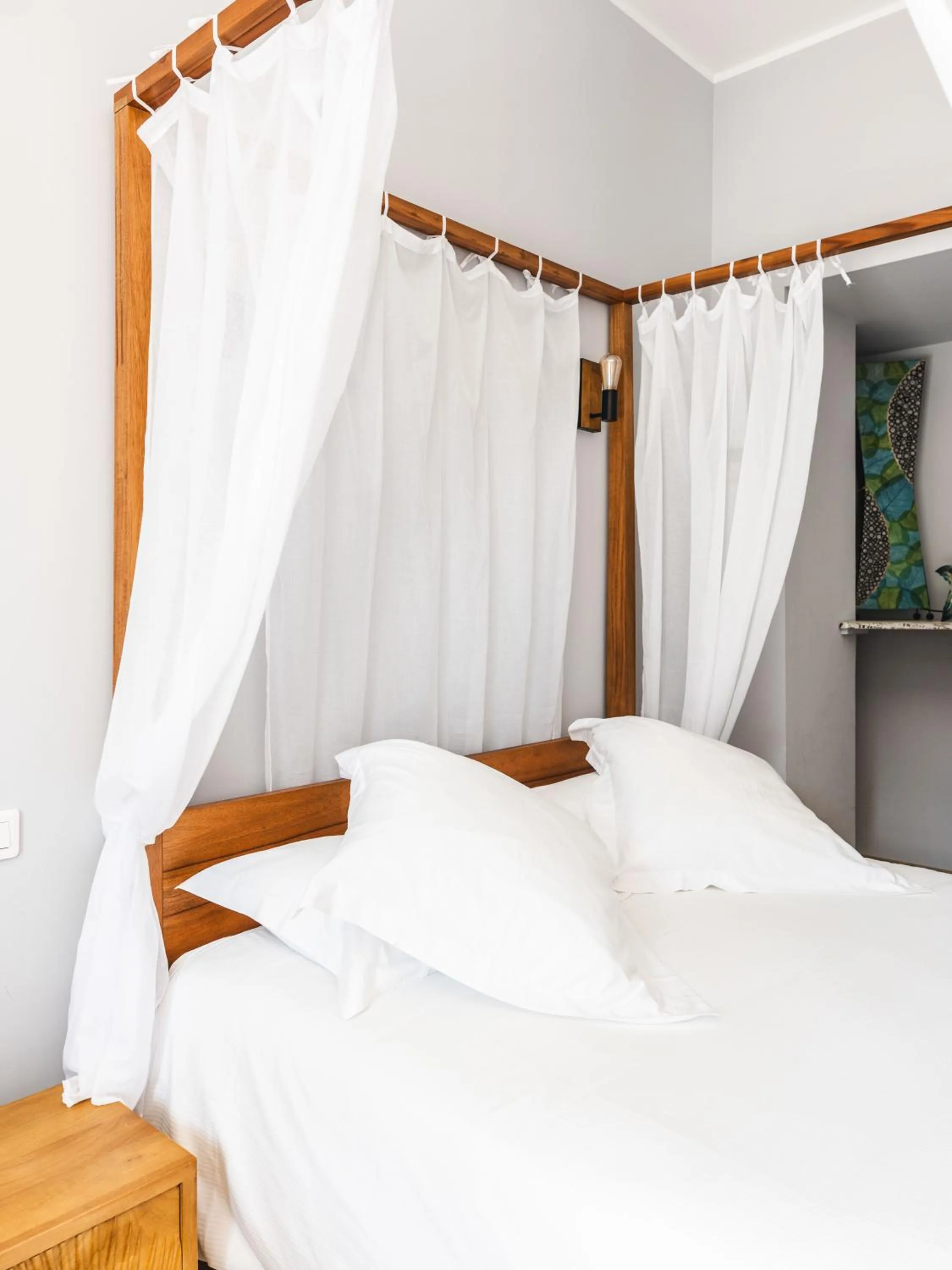 Bed in Le Suffren Hôtel