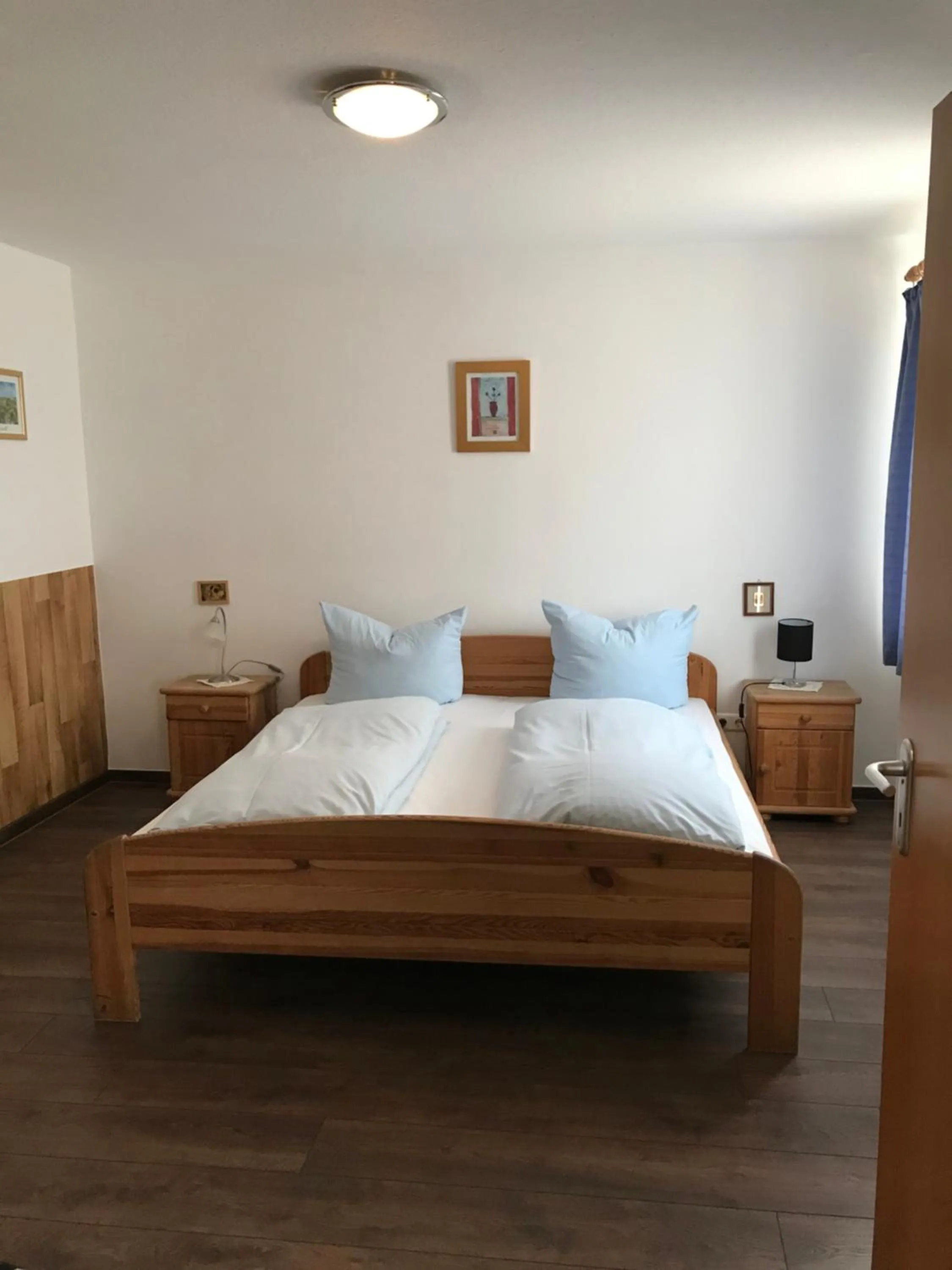 Bed in Hotel Guntia Boardinghouse virtueller check in und Zimmer Zugang