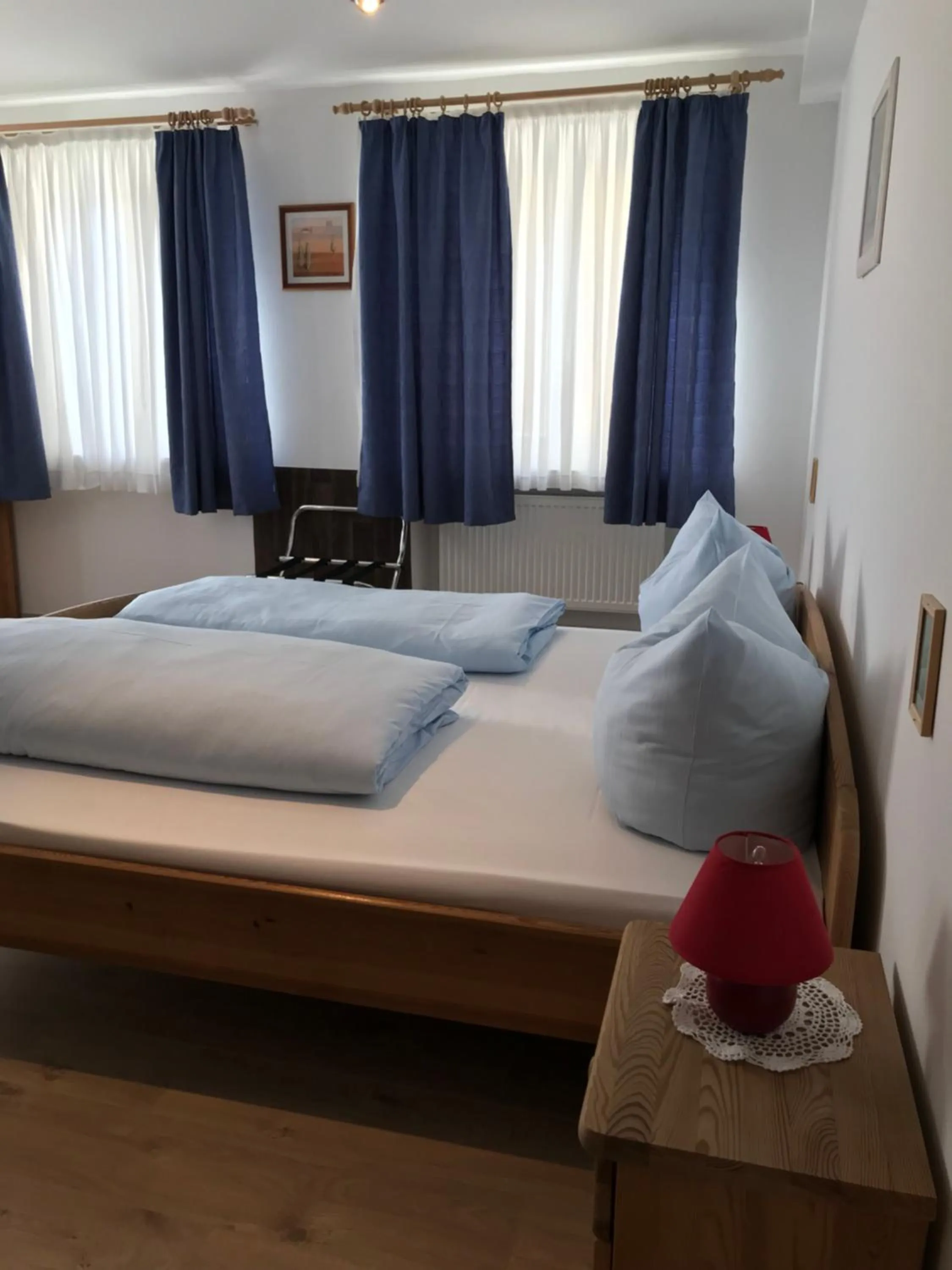 Bed in Hotel Guntia Boardinghouse virtueller check in und Zimmer Zugang