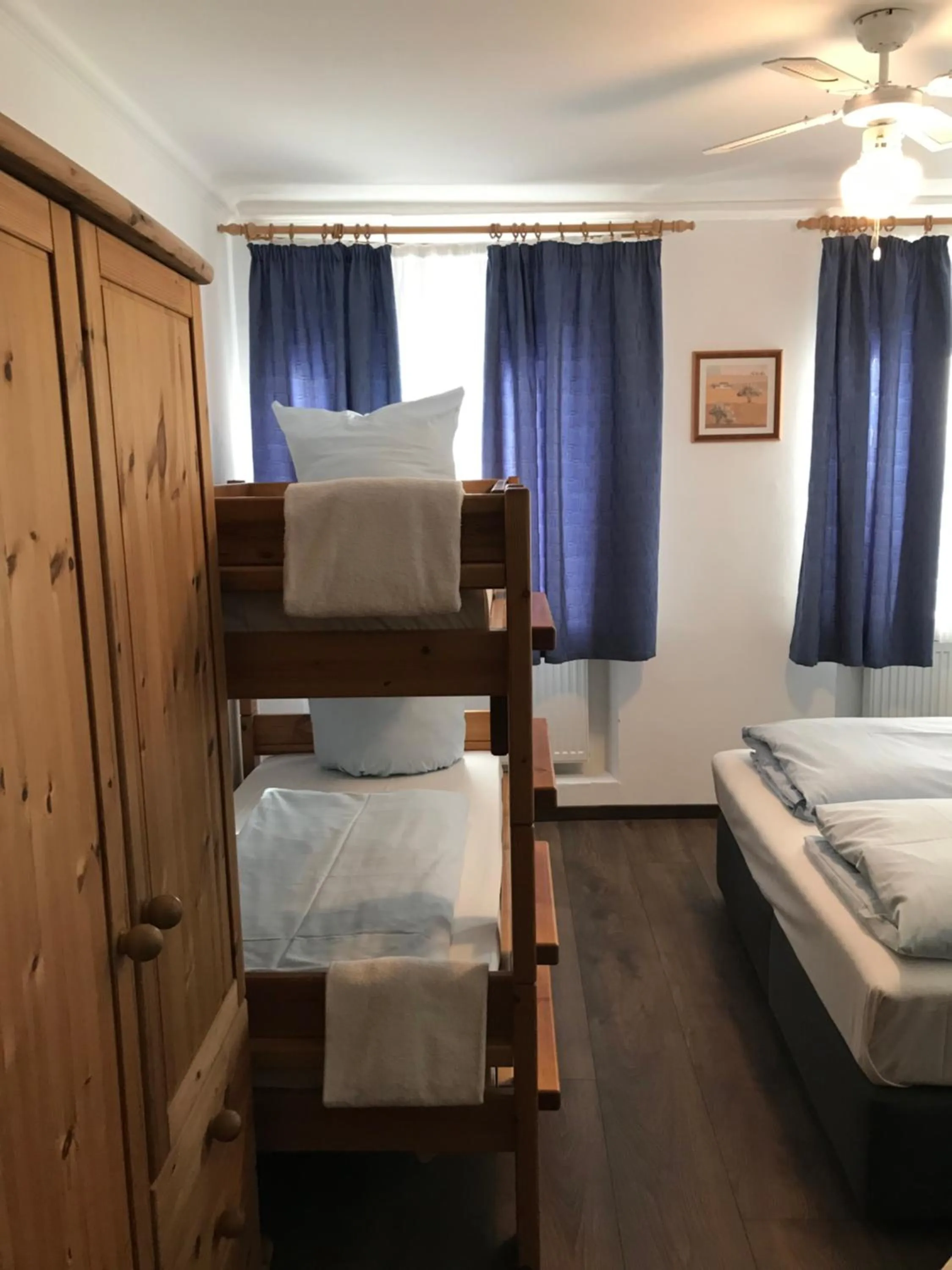 Bed in Hotel Guntia Boardinghouse virtueller check in und Zimmer Zugang