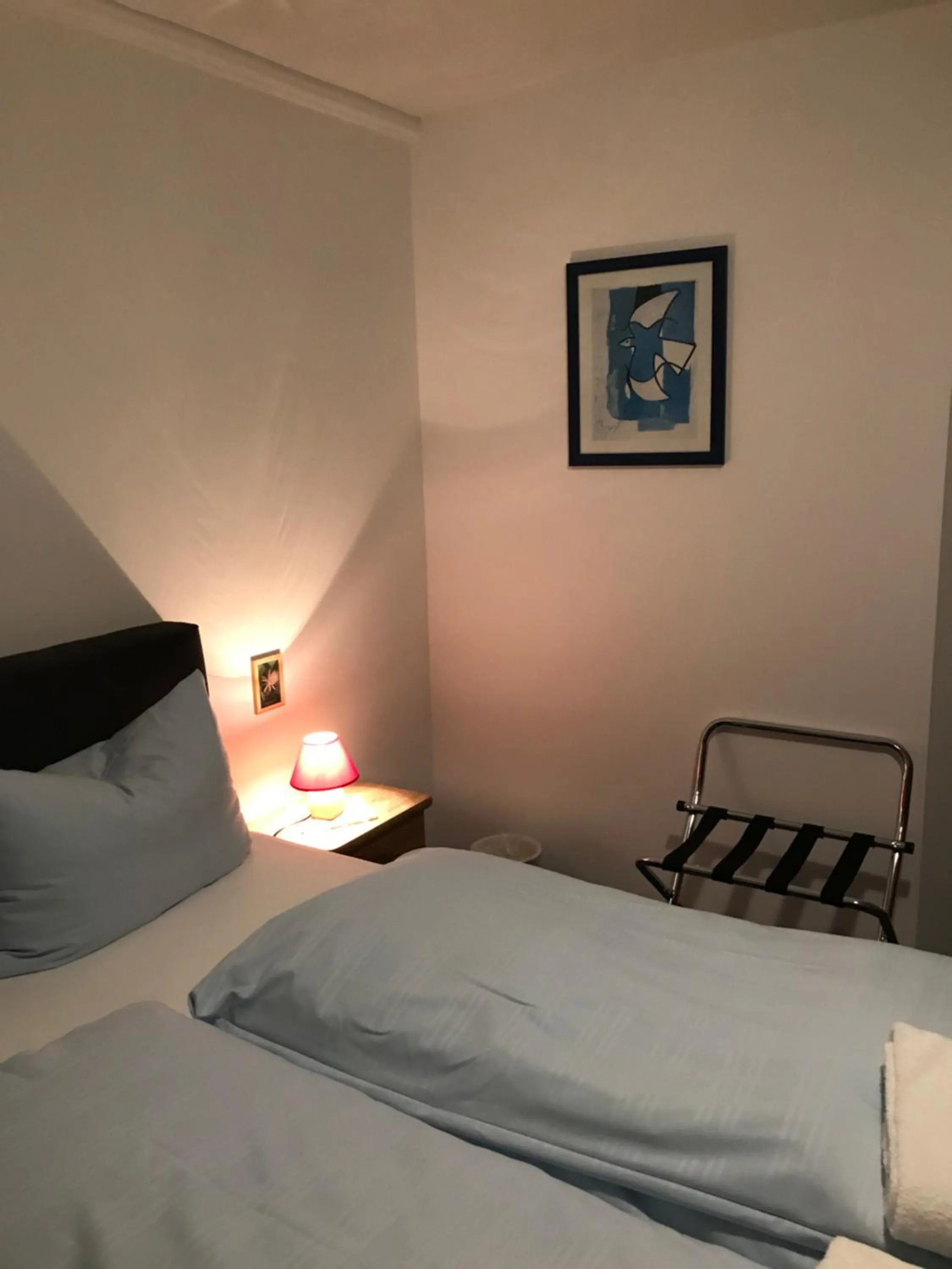 Bed in Hotel Guntia Boardinghouse virtueller check in und Zimmer Zugang