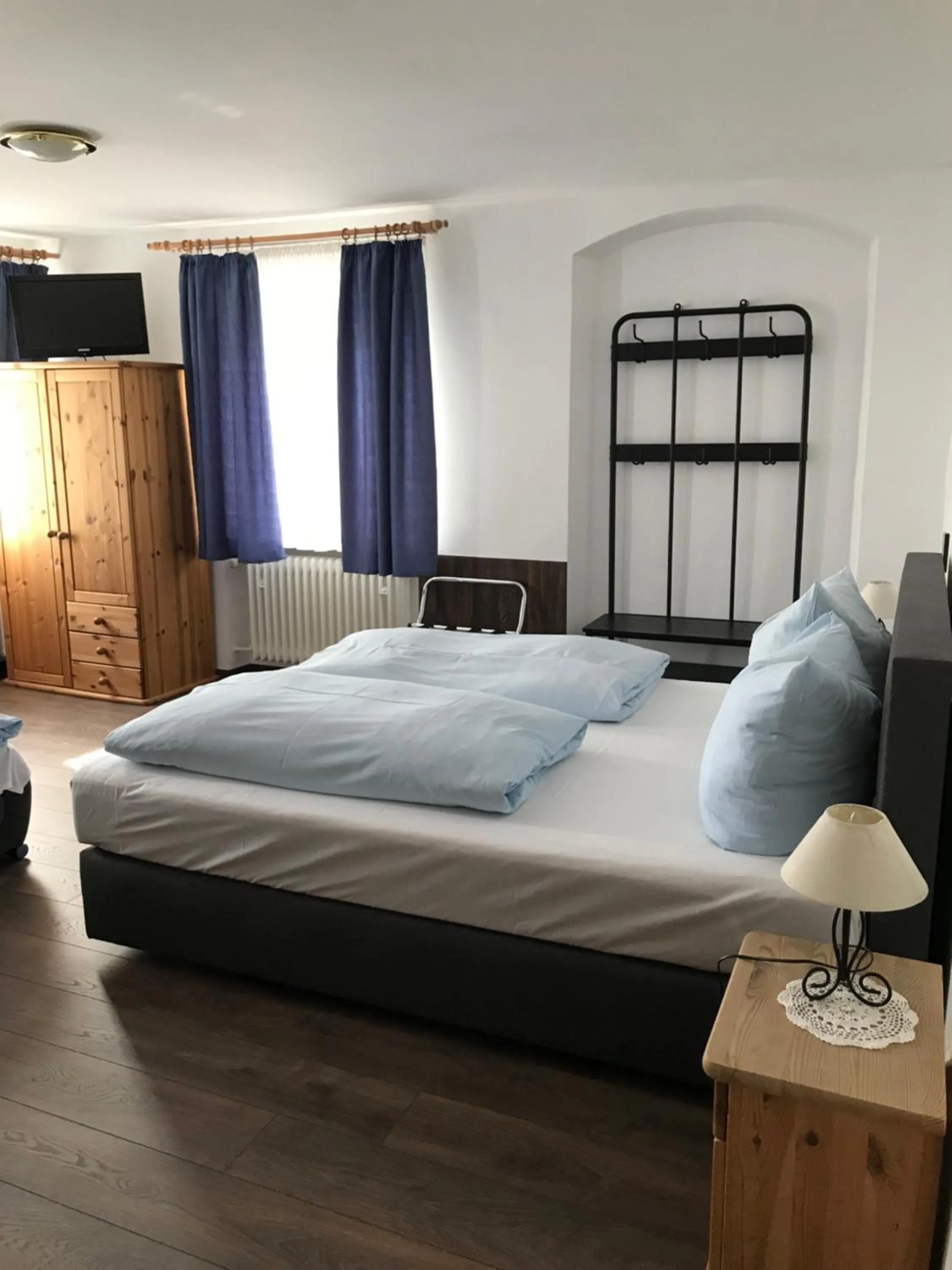 Bed in Hotel Guntia Boardinghouse virtueller check in und Zimmer Zugang