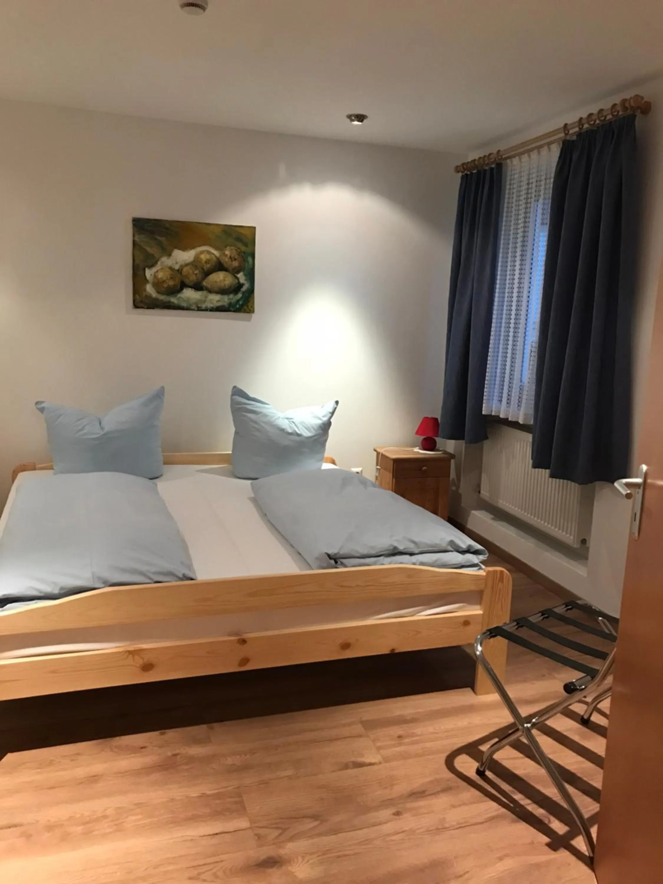 Bed in Hotel Guntia Boardinghouse virtueller check in und Zimmer Zugang