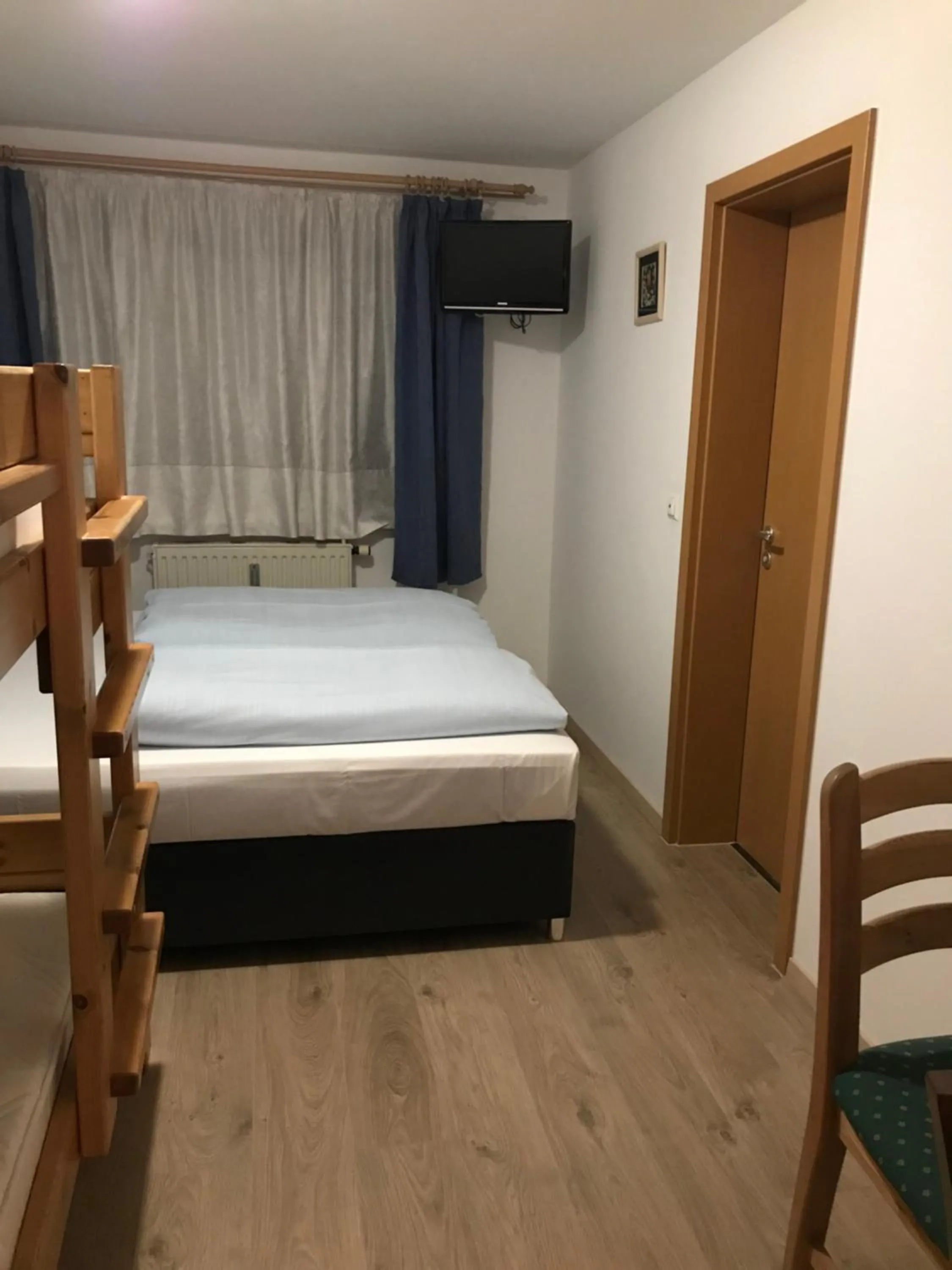 Bed in Hotel Guntia Boardinghouse virtueller check in und Zimmer Zugang