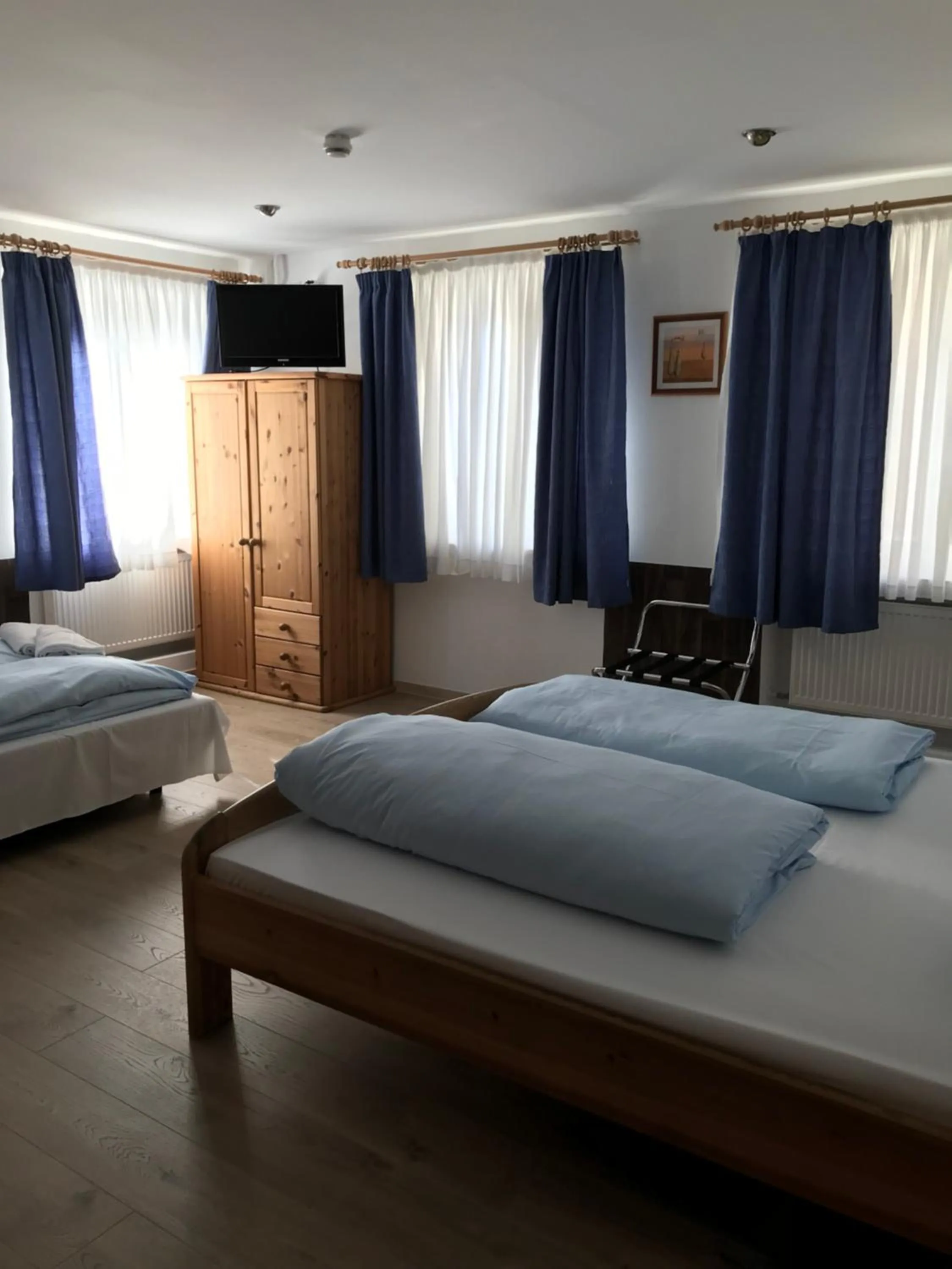 Bed in Hotel Guntia Boardinghouse virtueller check in und Zimmer Zugang
