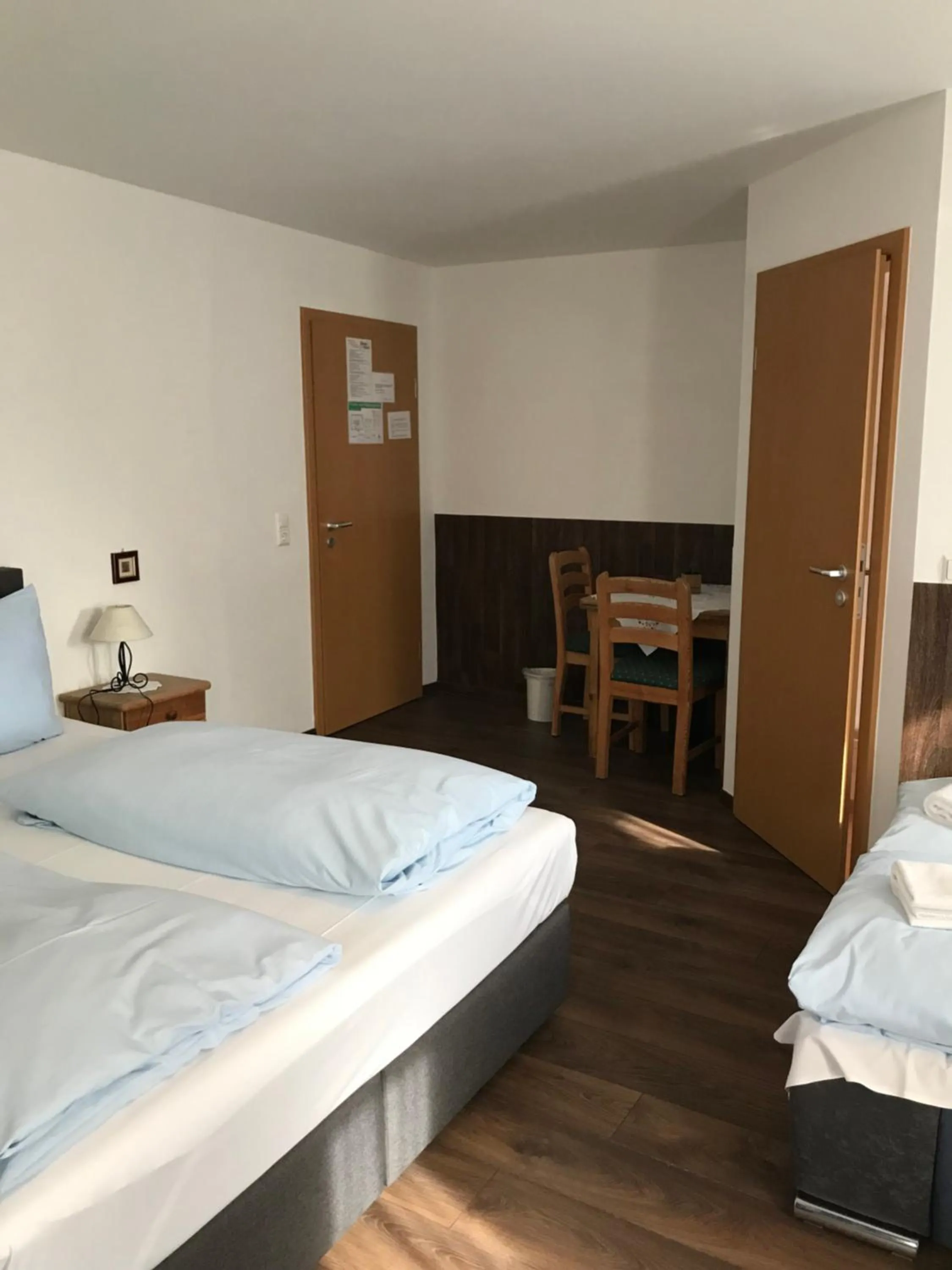 Bed in Hotel Guntia Boardinghouse virtueller check in und Zimmer Zugang