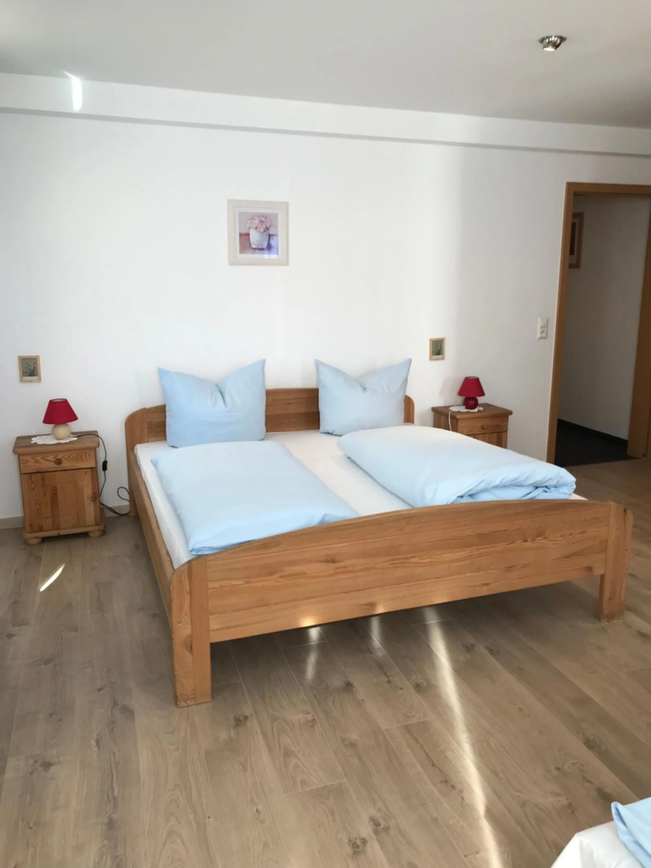 Bed in Hotel Guntia Boardinghouse virtueller check in und Zimmer Zugang