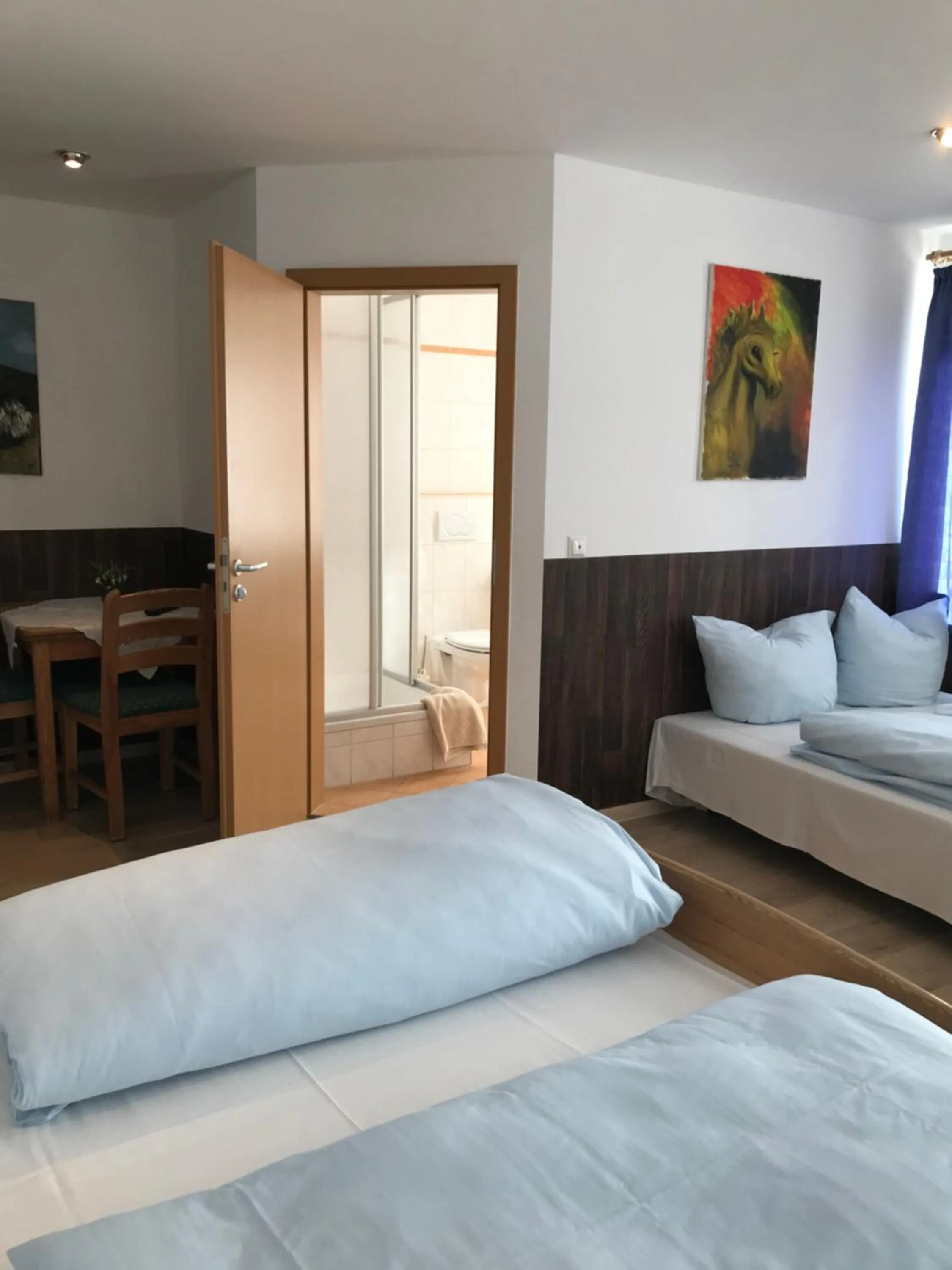Bed in Hotel Guntia Boardinghouse virtueller check in und Zimmer Zugang