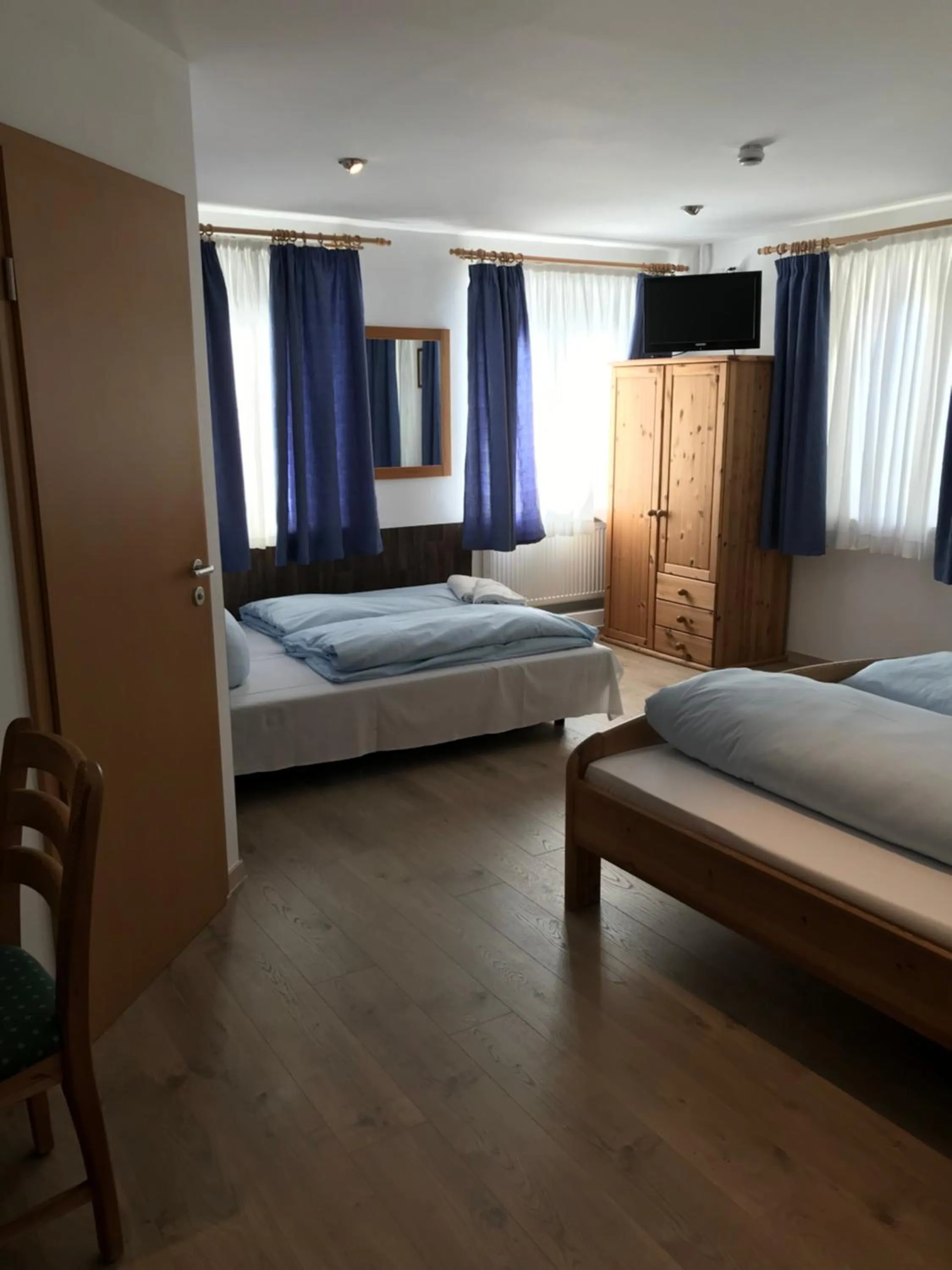 Bed in Hotel Guntia Boardinghouse virtueller check in und Zimmer Zugang