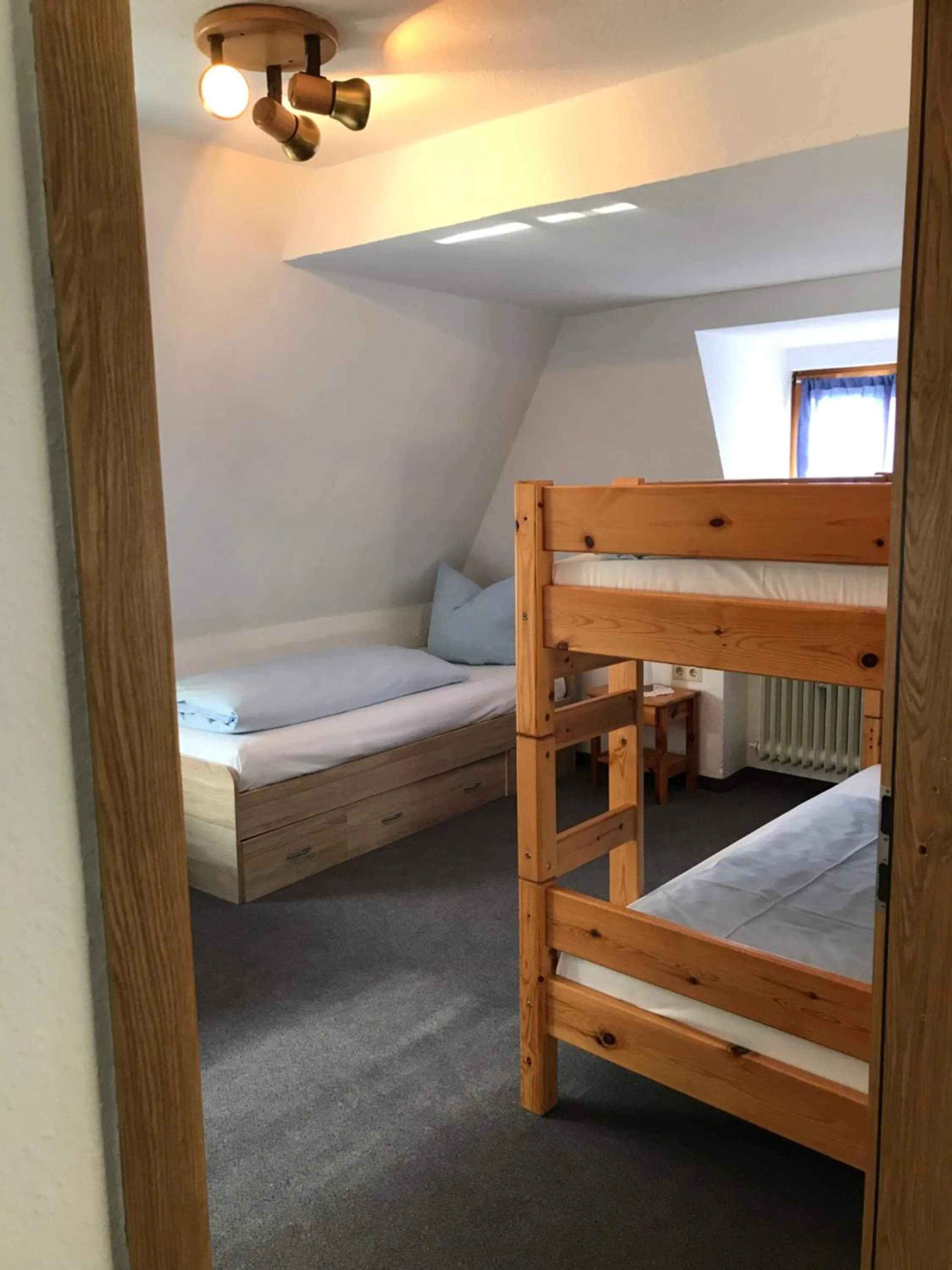 Bed in Hotel Guntia Boardinghouse virtueller check in und Zimmer Zugang