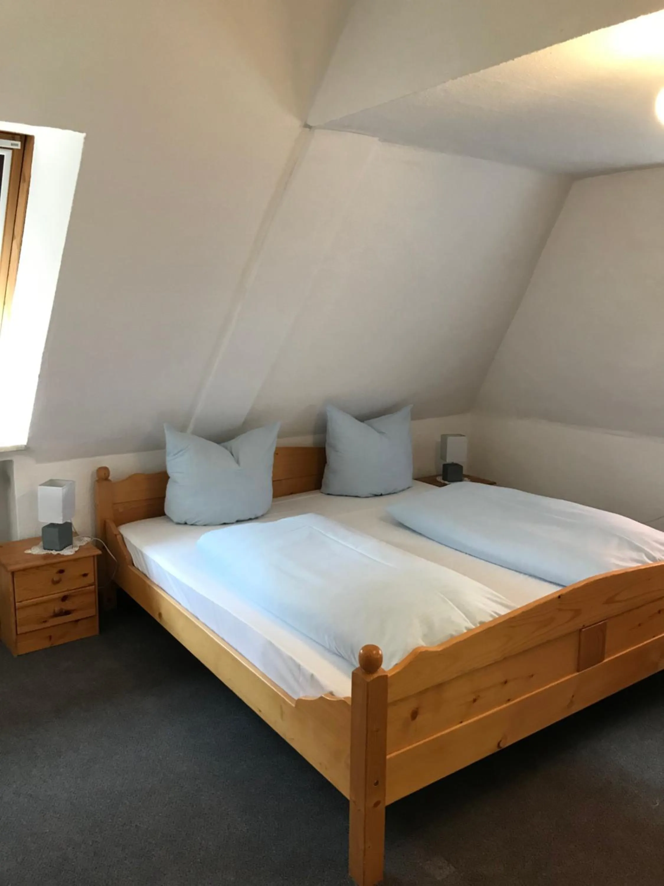 Bed in Hotel Guntia Boardinghouse virtueller check in und Zimmer Zugang