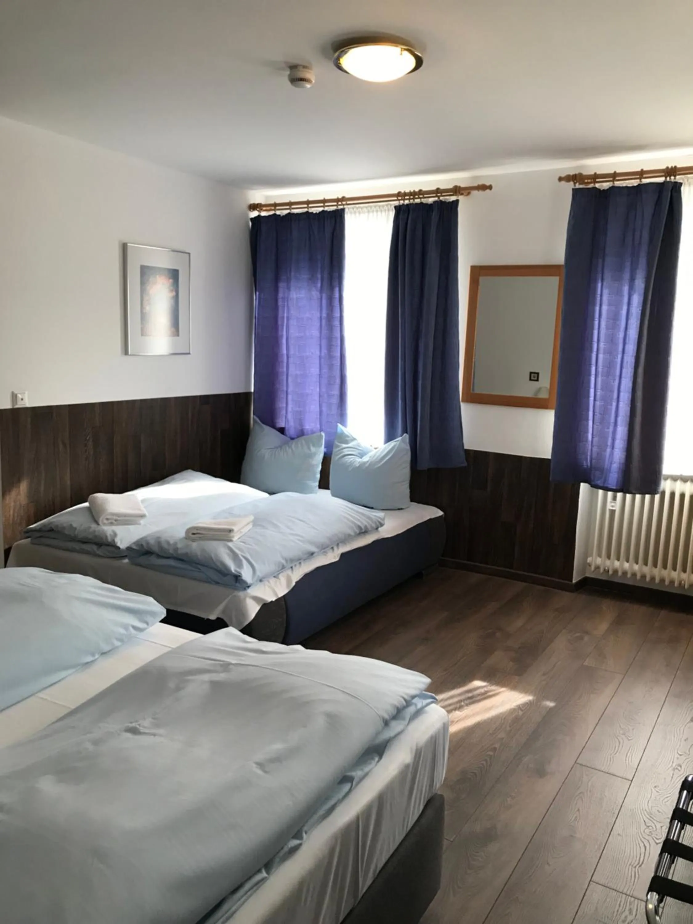 Bed in Hotel Guntia Boardinghouse virtueller check in und Zimmer Zugang