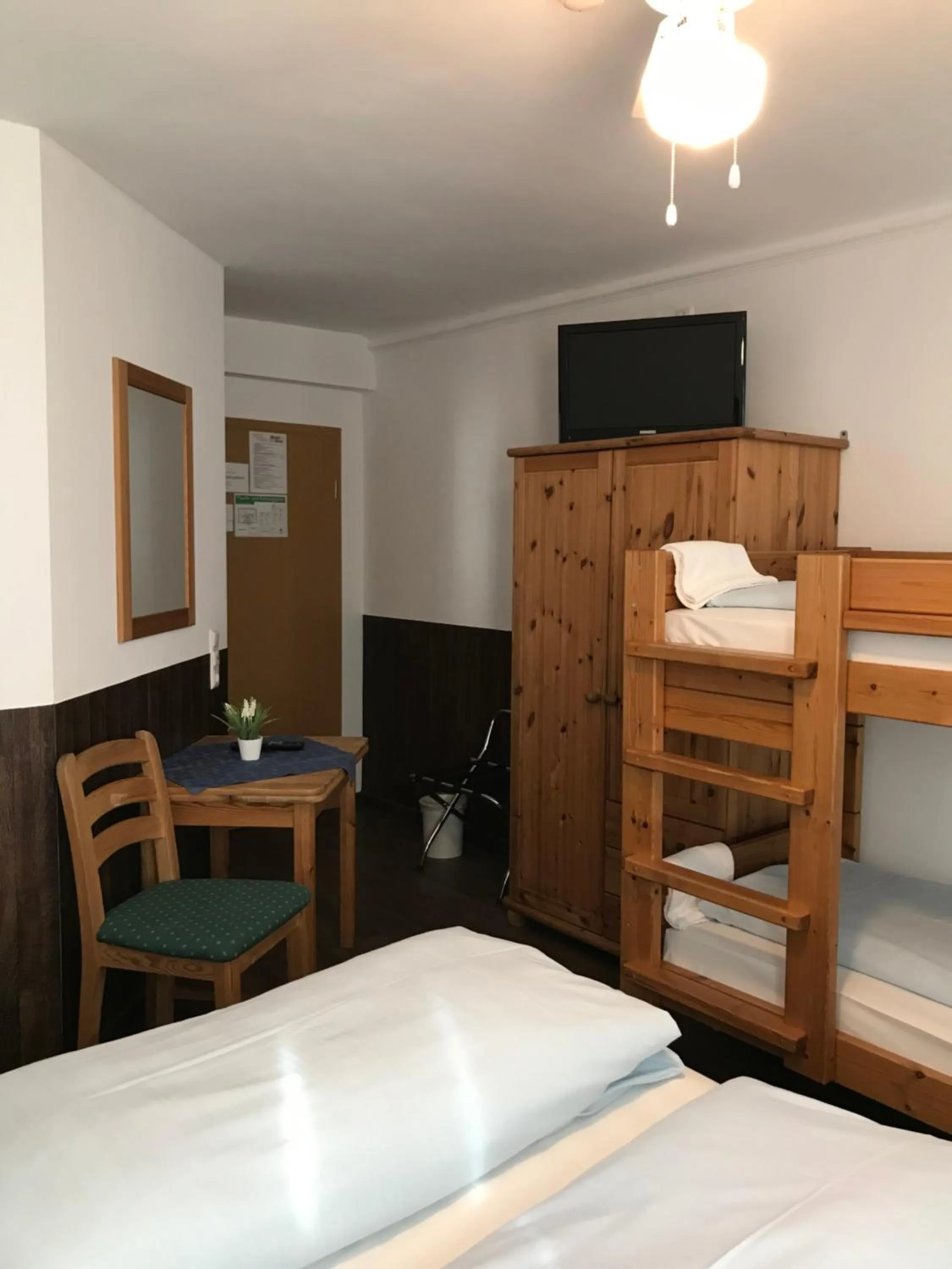 Bed in Hotel Guntia Boardinghouse virtueller check in und Zimmer Zugang