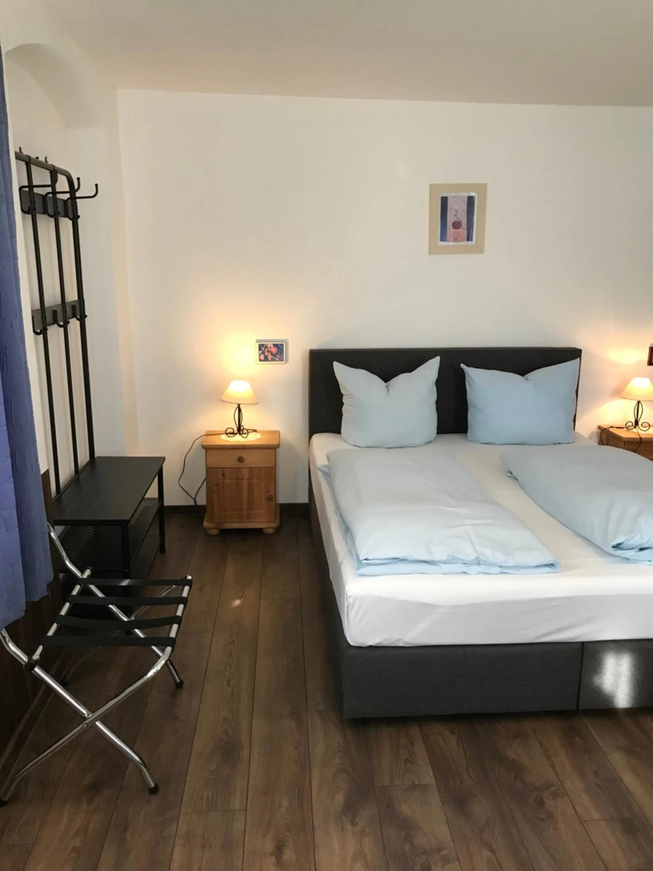 Bed in Hotel Guntia Boardinghouse virtueller check in und Zimmer Zugang