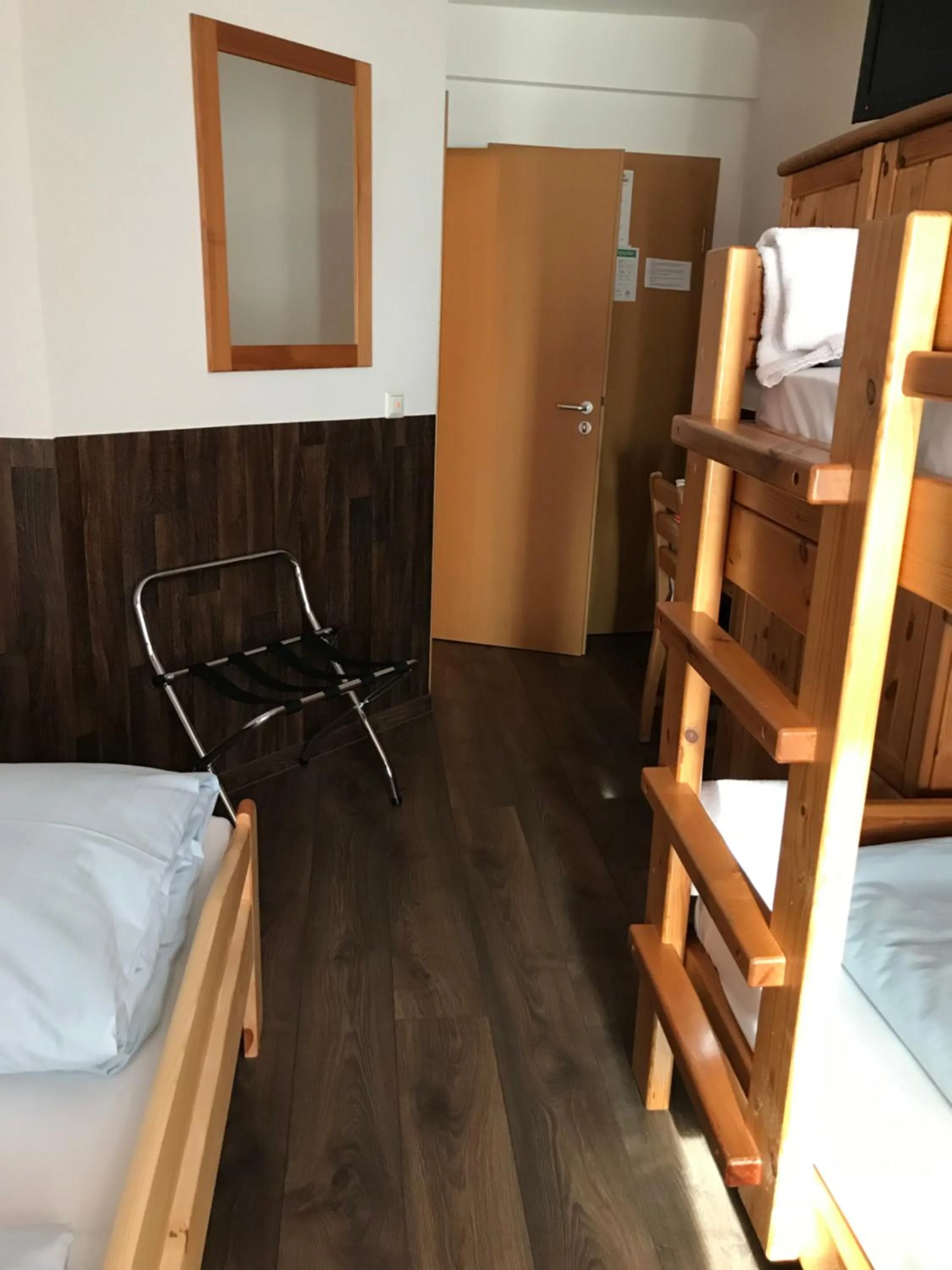 Bed in Hotel Guntia Boardinghouse virtueller check in und Zimmer Zugang
