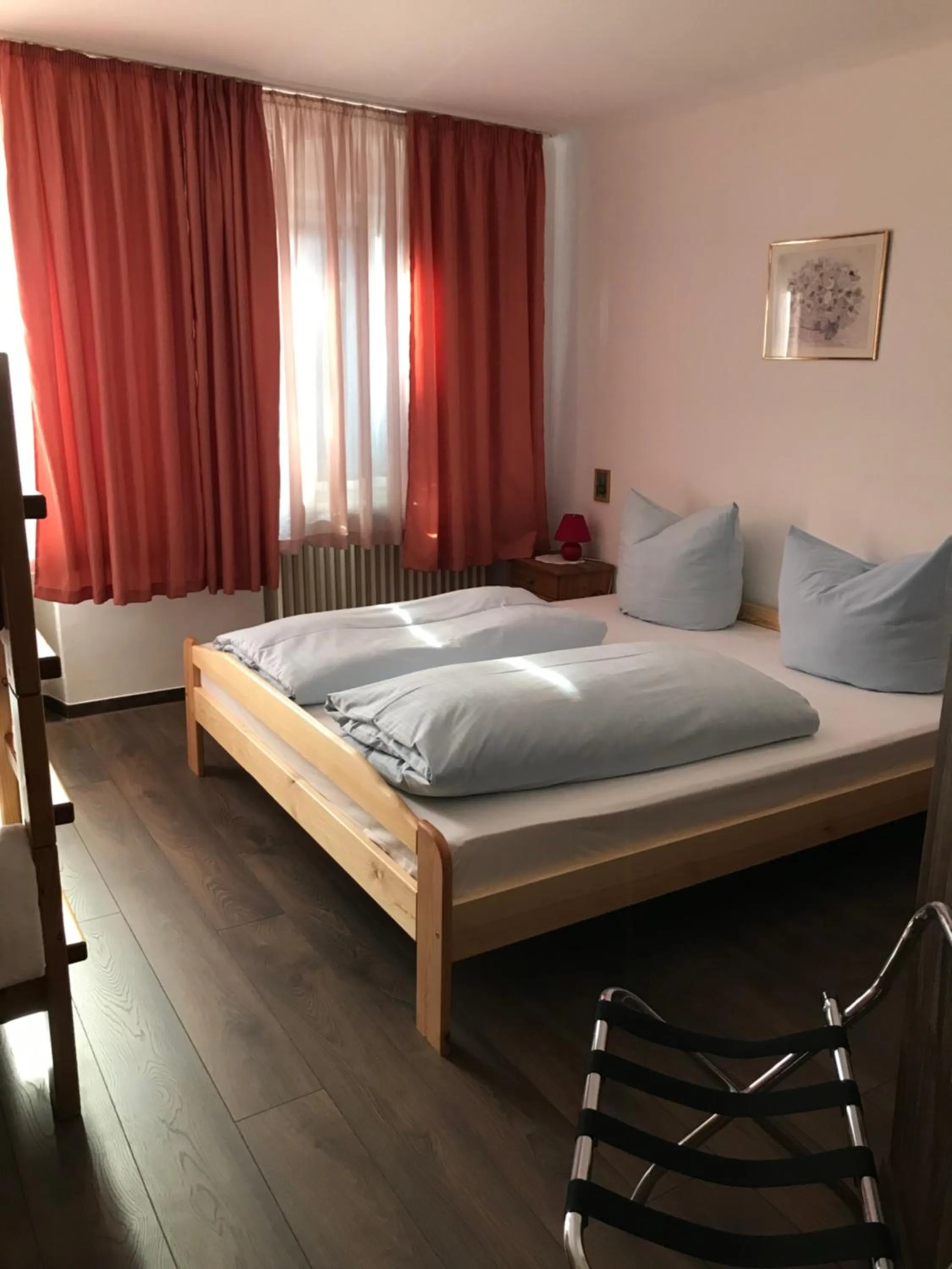 Bed in Hotel Guntia Boardinghouse virtueller check in und Zimmer Zugang