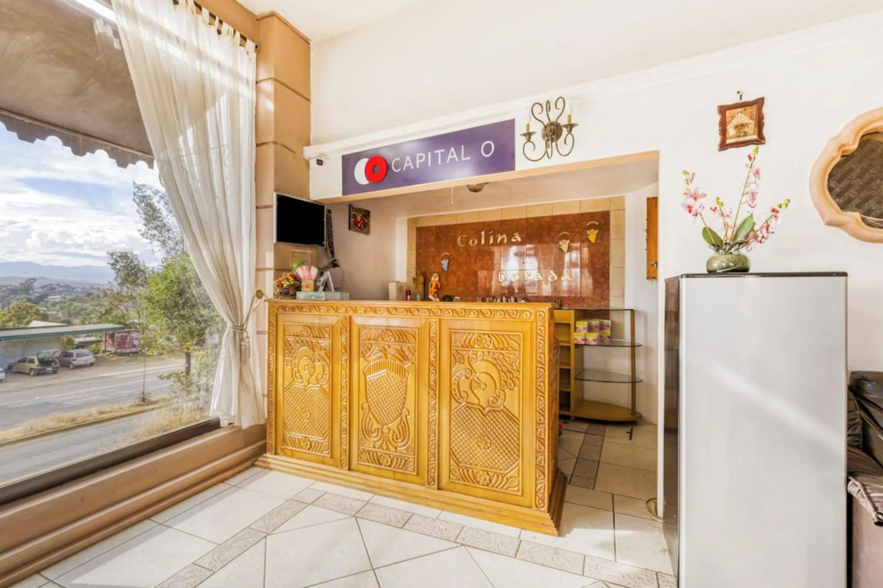 Lobby or reception in Capital O Colina Dorada
