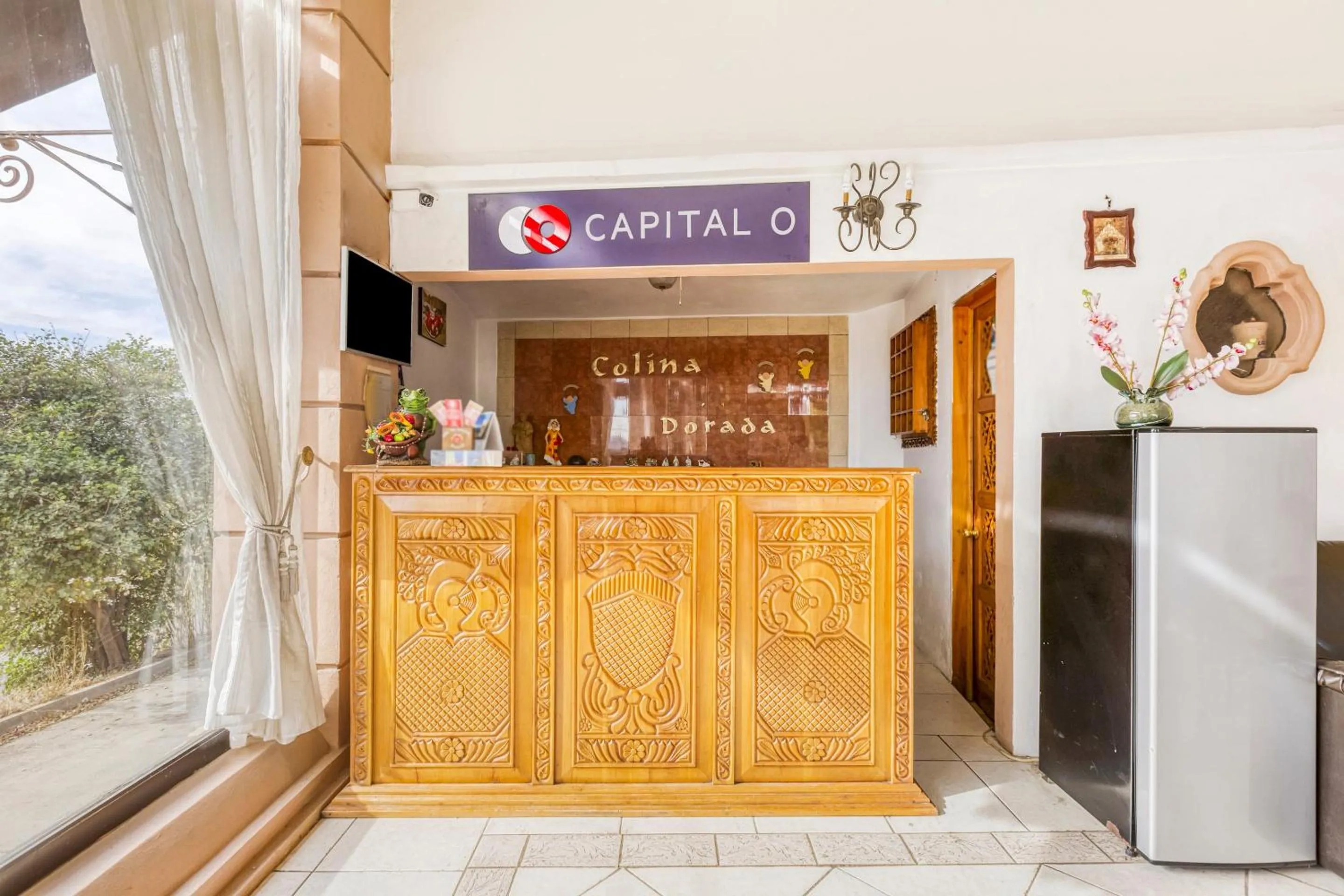 Lobby or reception in Capital O Colina Dorada