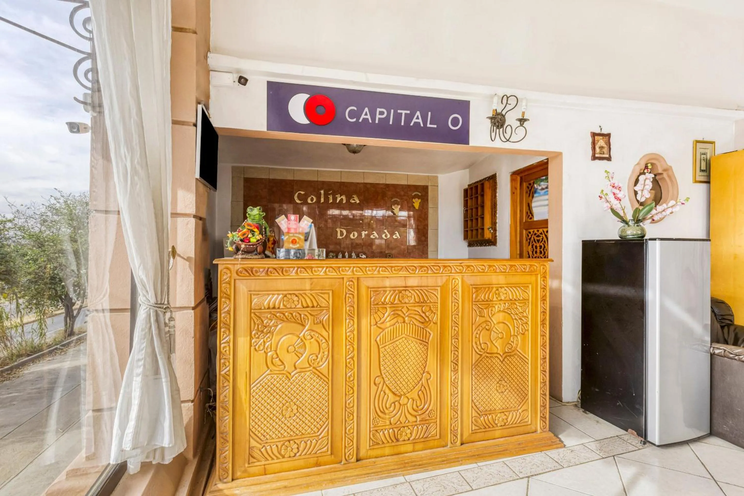 Lobby or reception in Capital O Colina Dorada