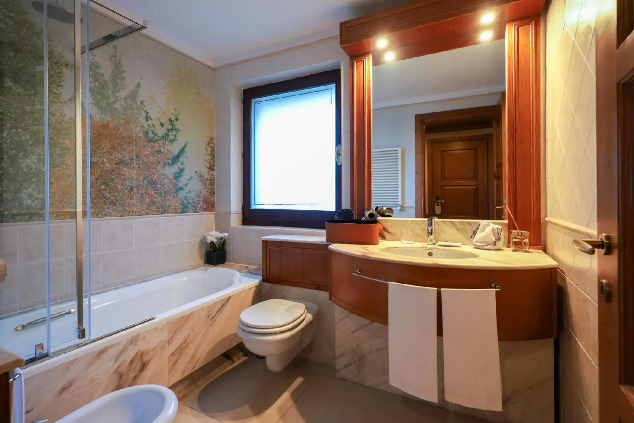 Bathroom in QC Hotel Monte Bianco Bathroom in QC Hotel Monte Bianco