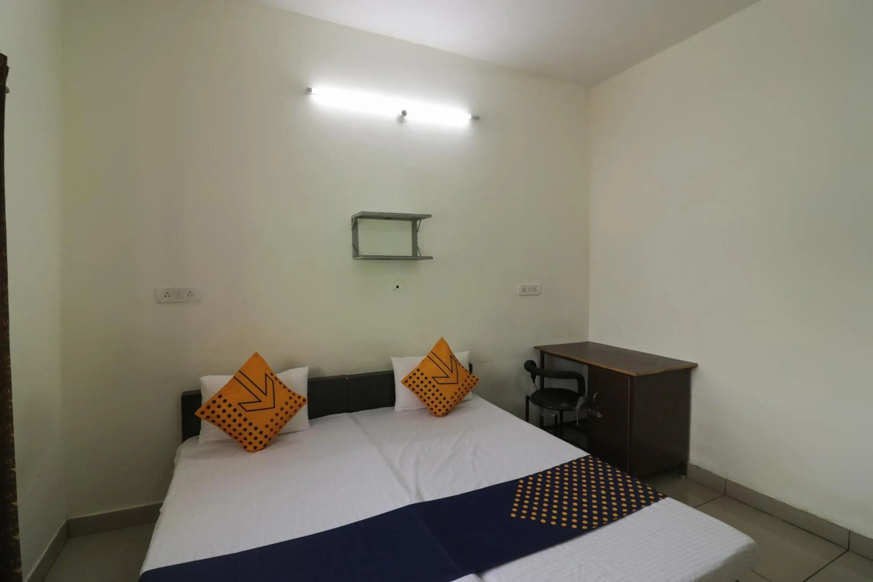 Bedroom in SPOT ON Sneha Home Stay