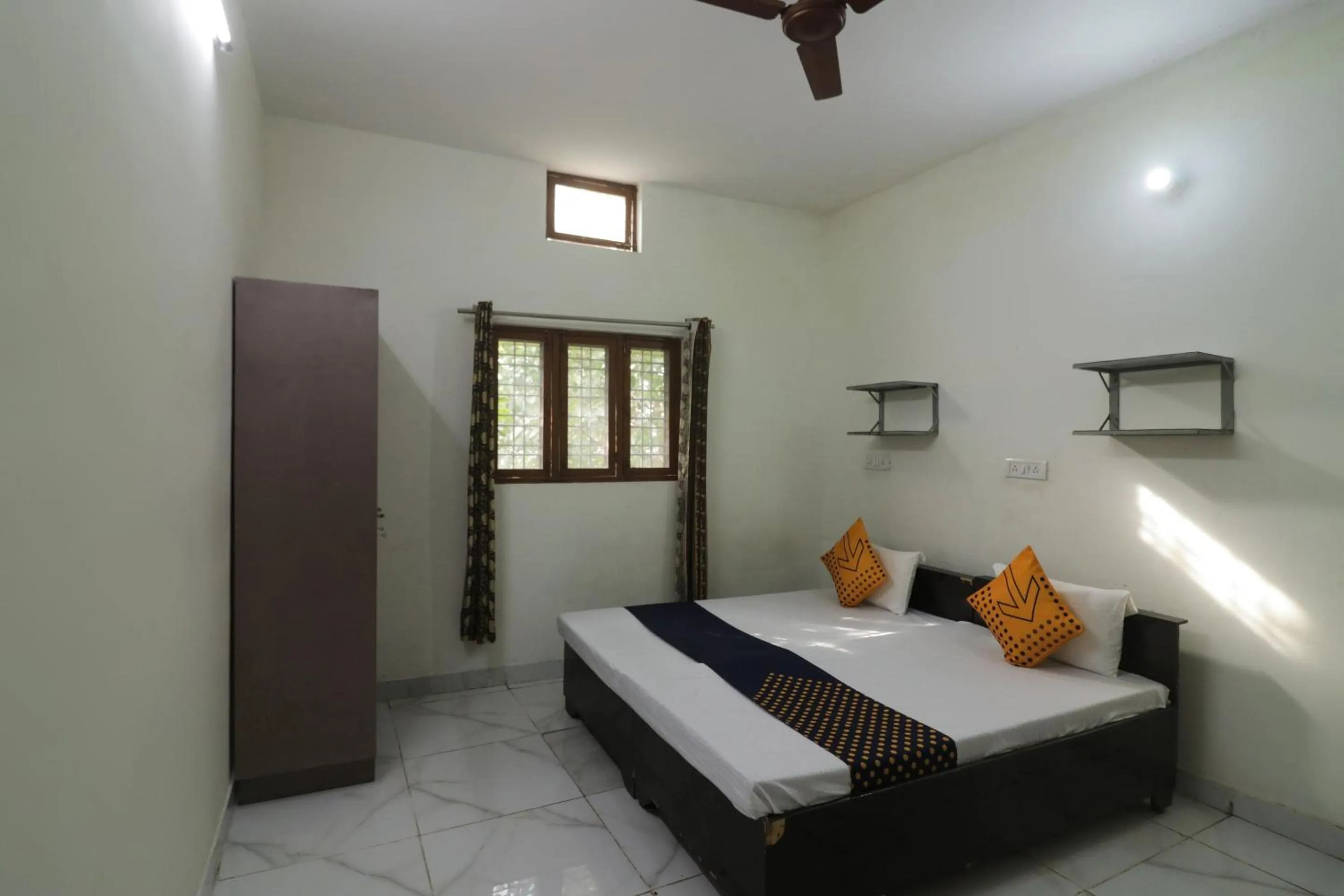 Bedroom in SPOT ON Sneha Home Stay