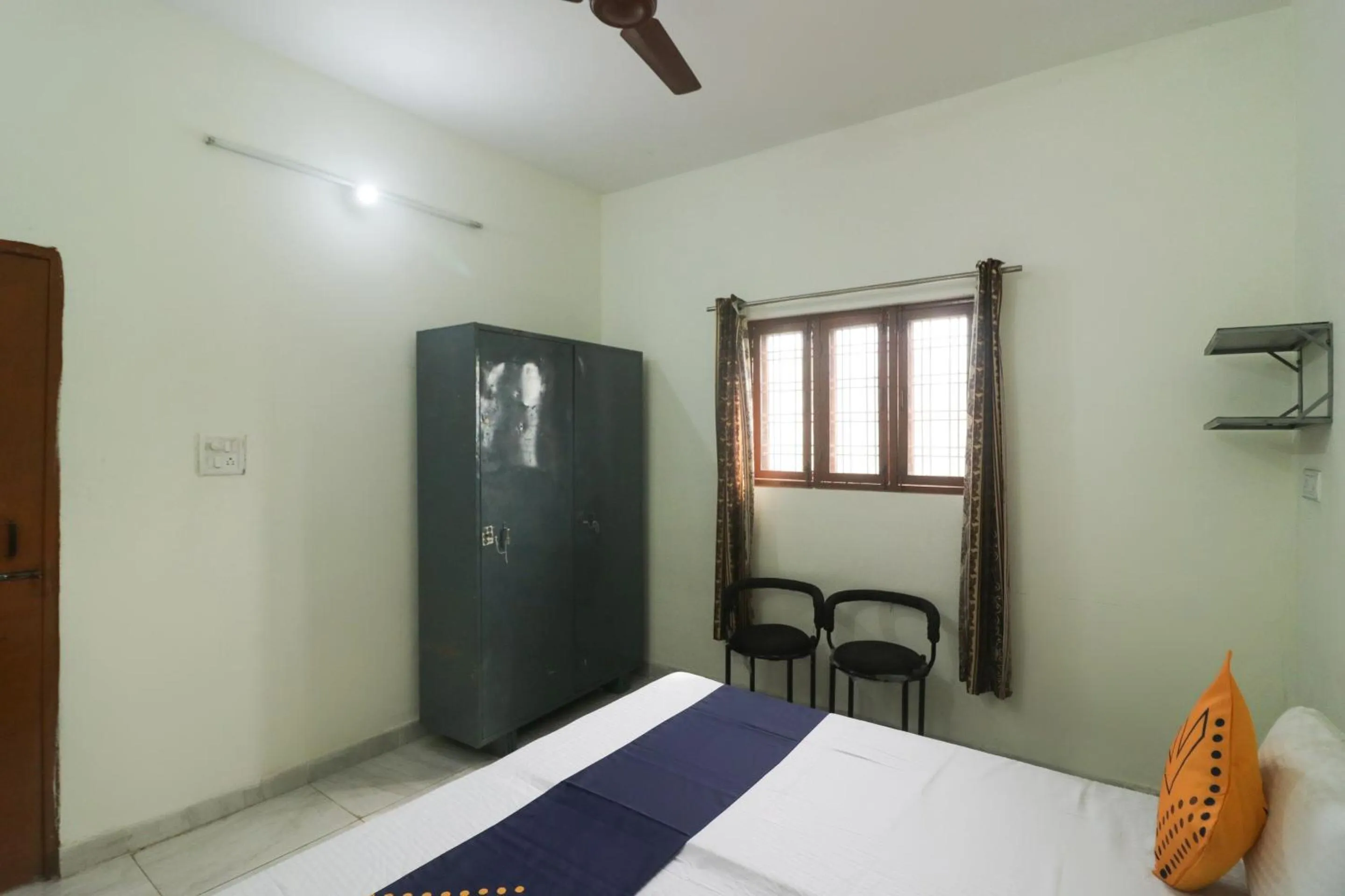 Bedroom in SPOT ON Sneha Home Stay