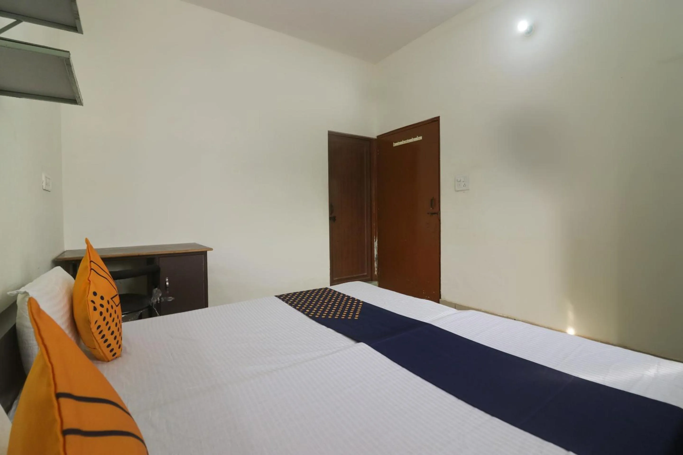 Bedroom in SPOT ON Sneha Home Stay