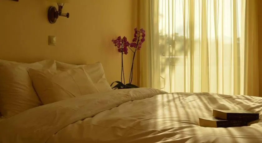 Bed in Alexakis Hotel & Spa