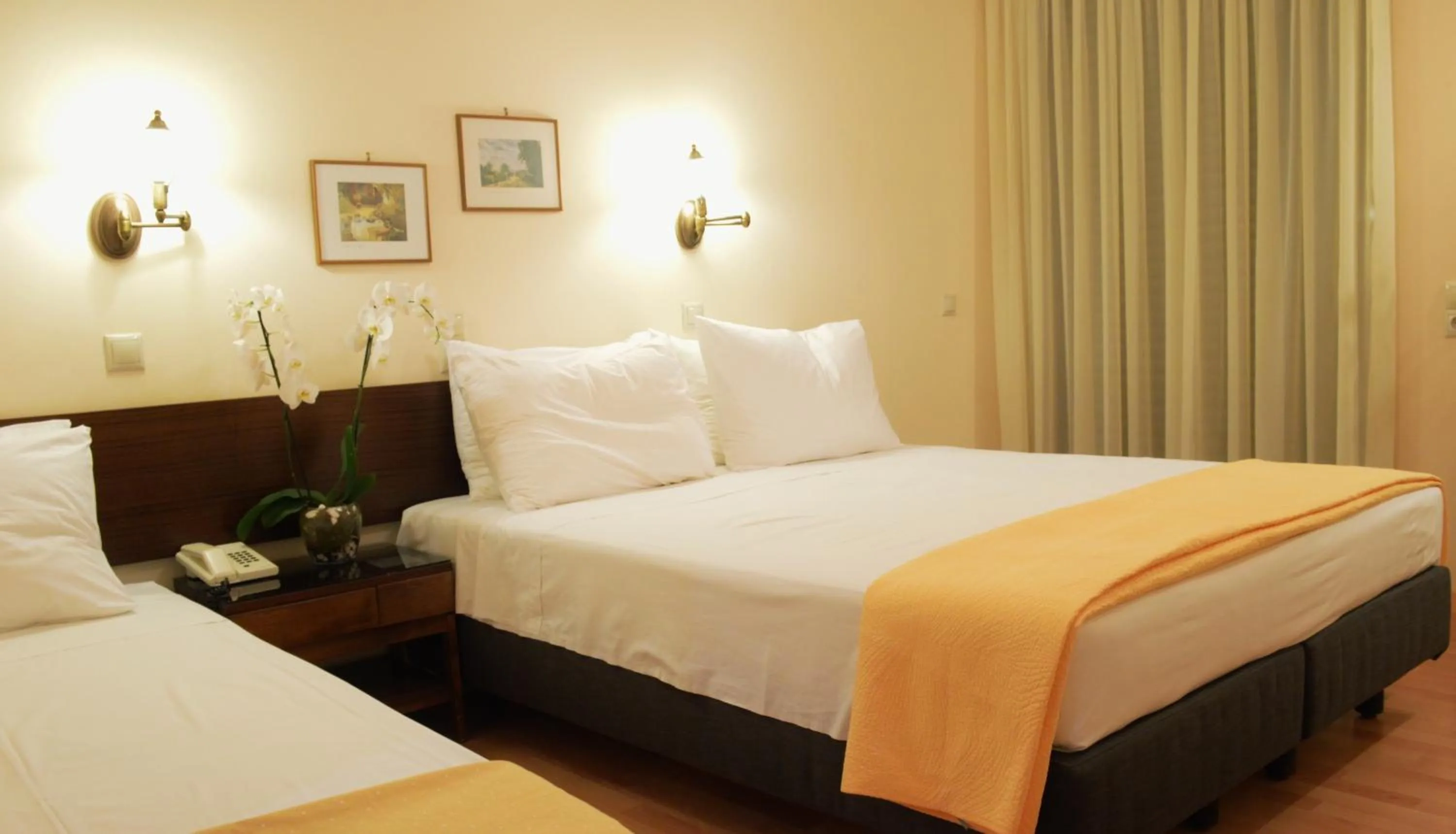 Bed in Alexakis Hotel & Spa