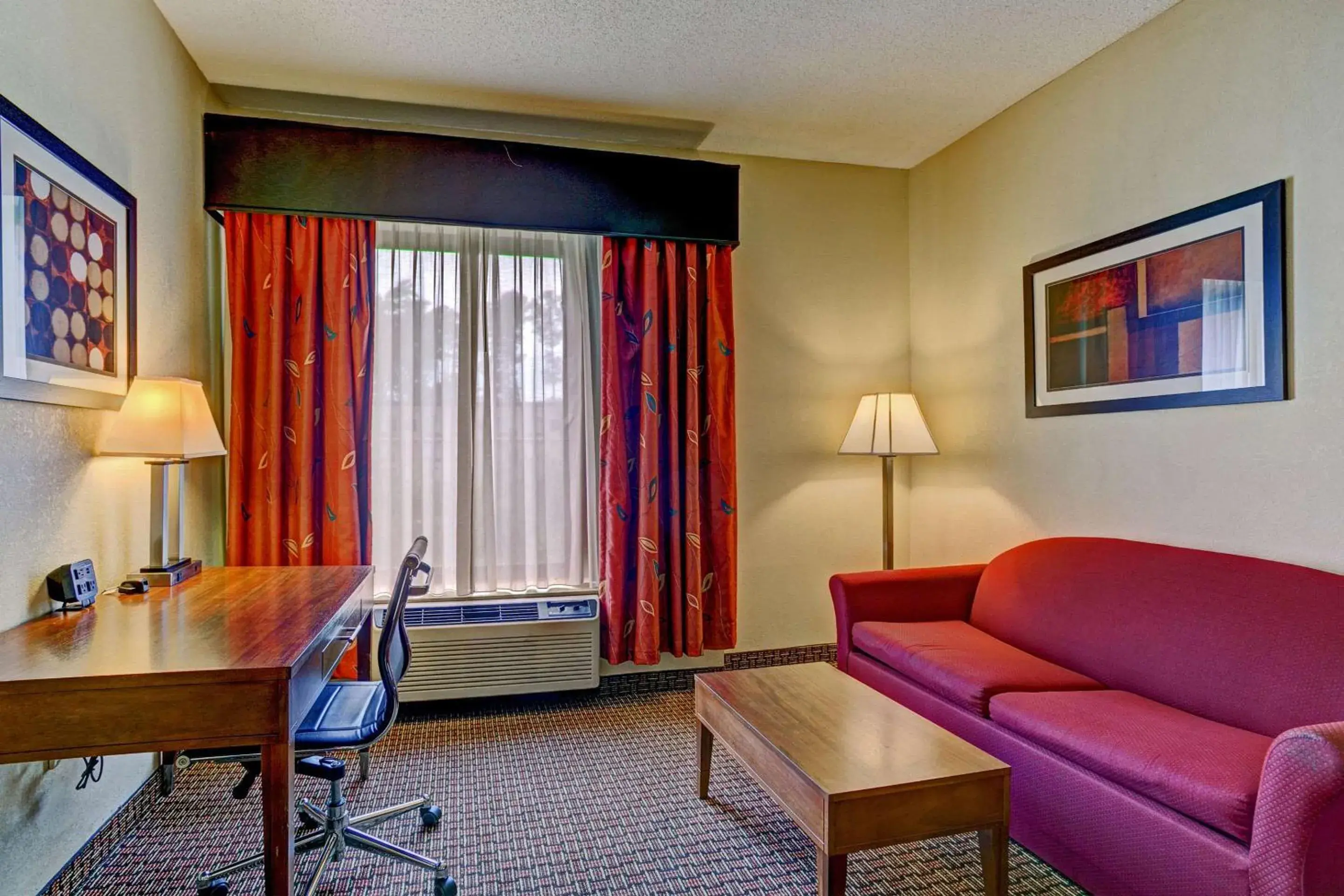 Bedroom, Seating Area in Comfort Suites Raleigh Durham Airport/Rtp