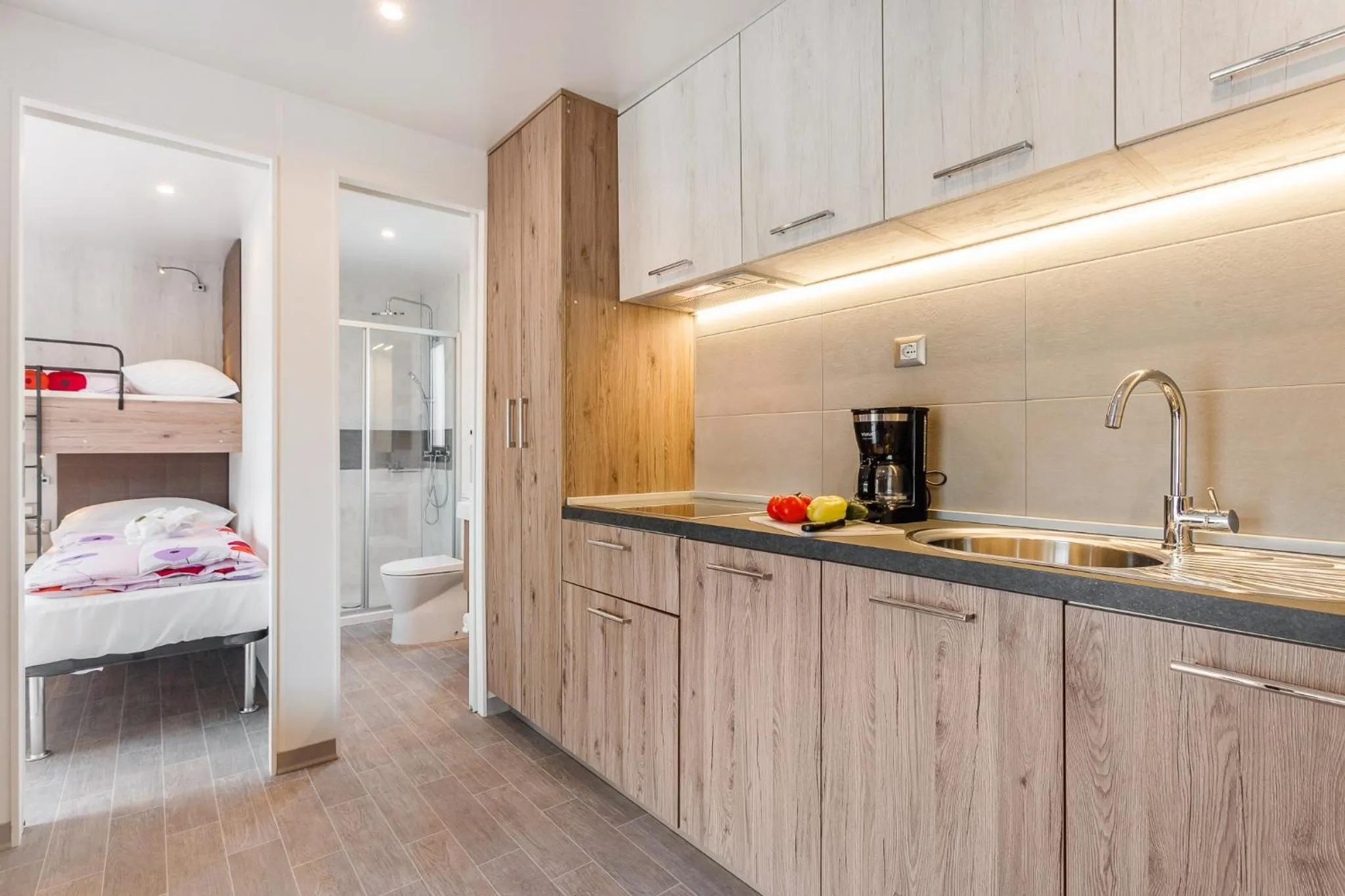 Kitchen or kitchenette in Premium Camping Homes Santa Marina, Lanterna