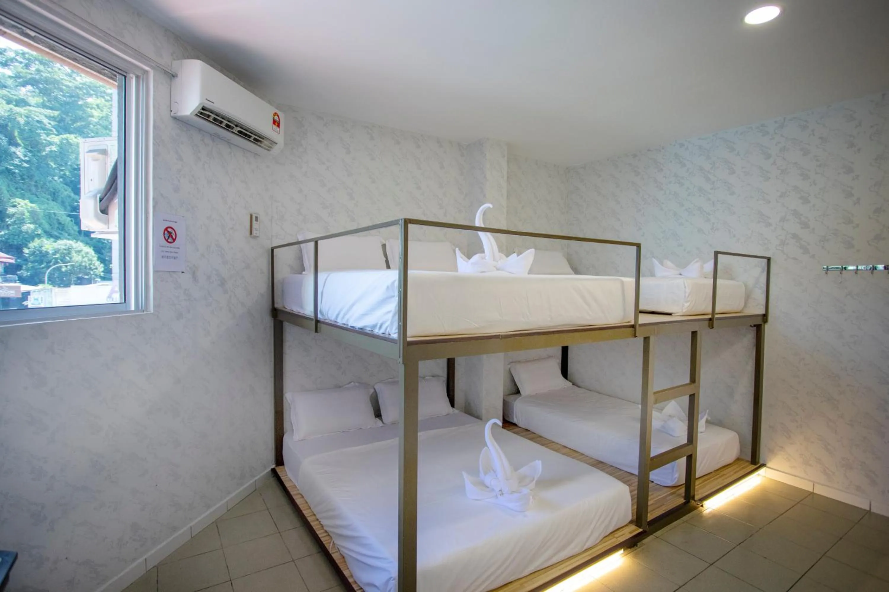 Bed in Lazy Cat Home At Gaya Street