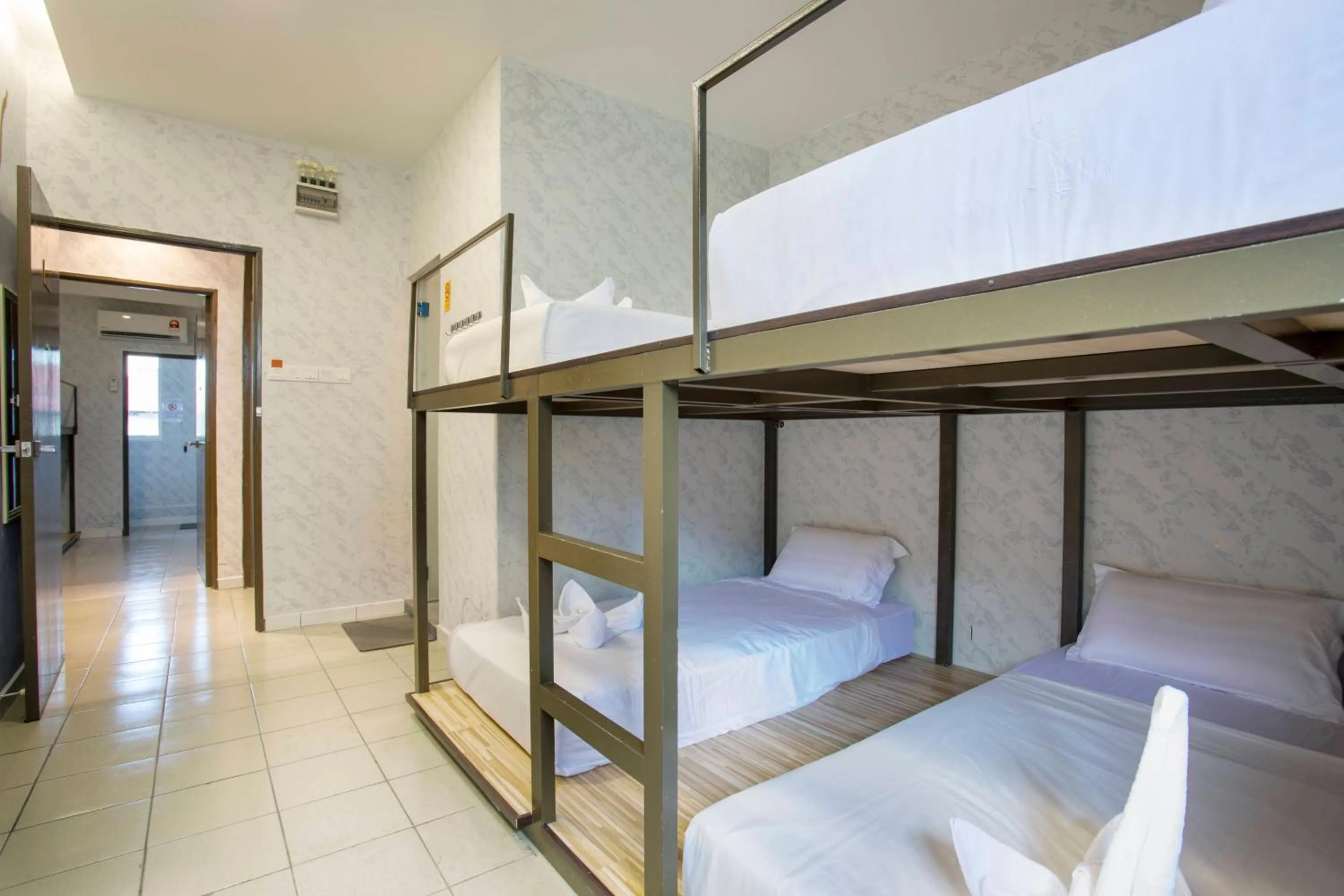 Bed in Lazy Cat Home At Gaya Street