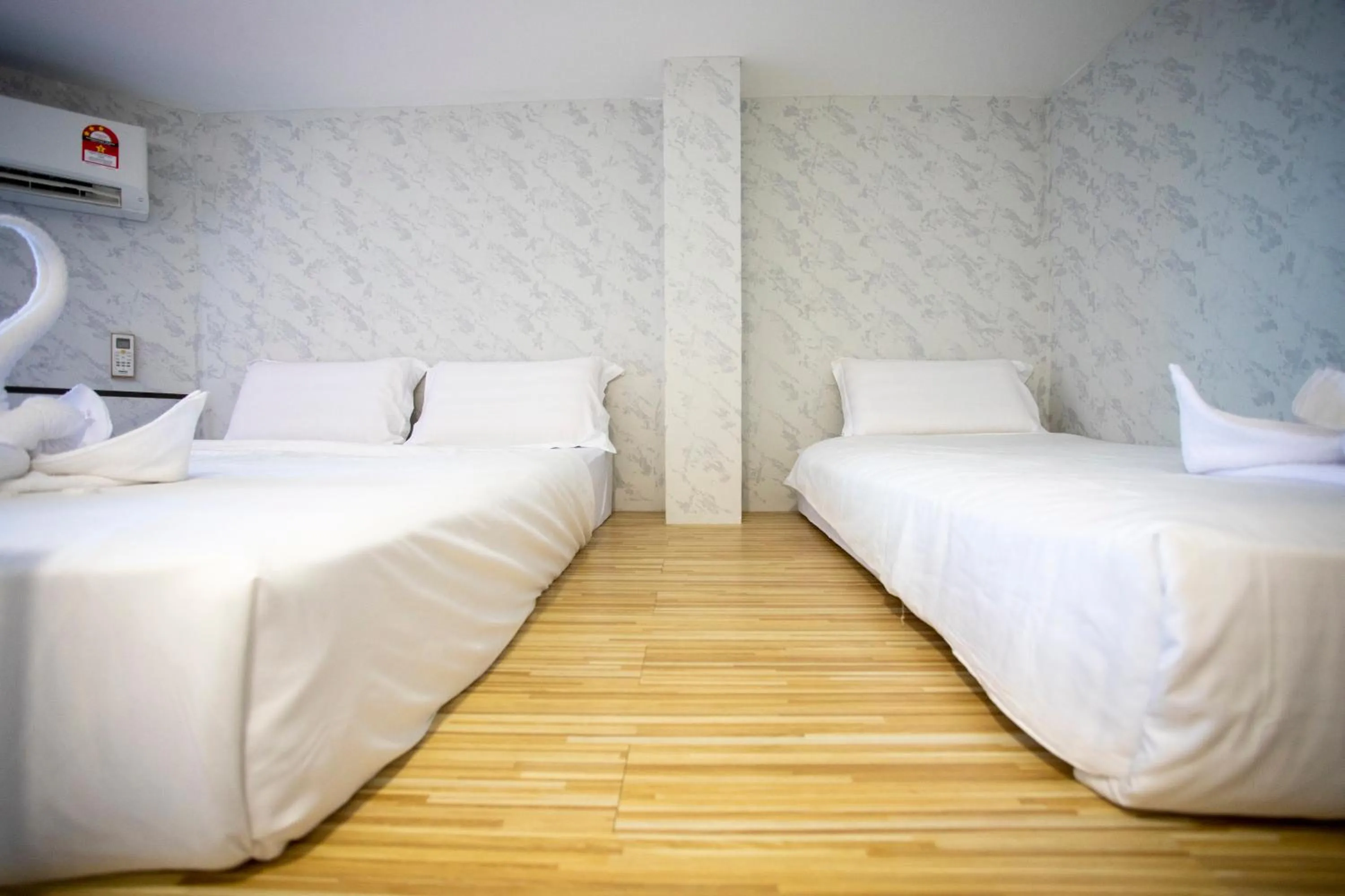 Bed in Lazy Cat Home At Gaya Street