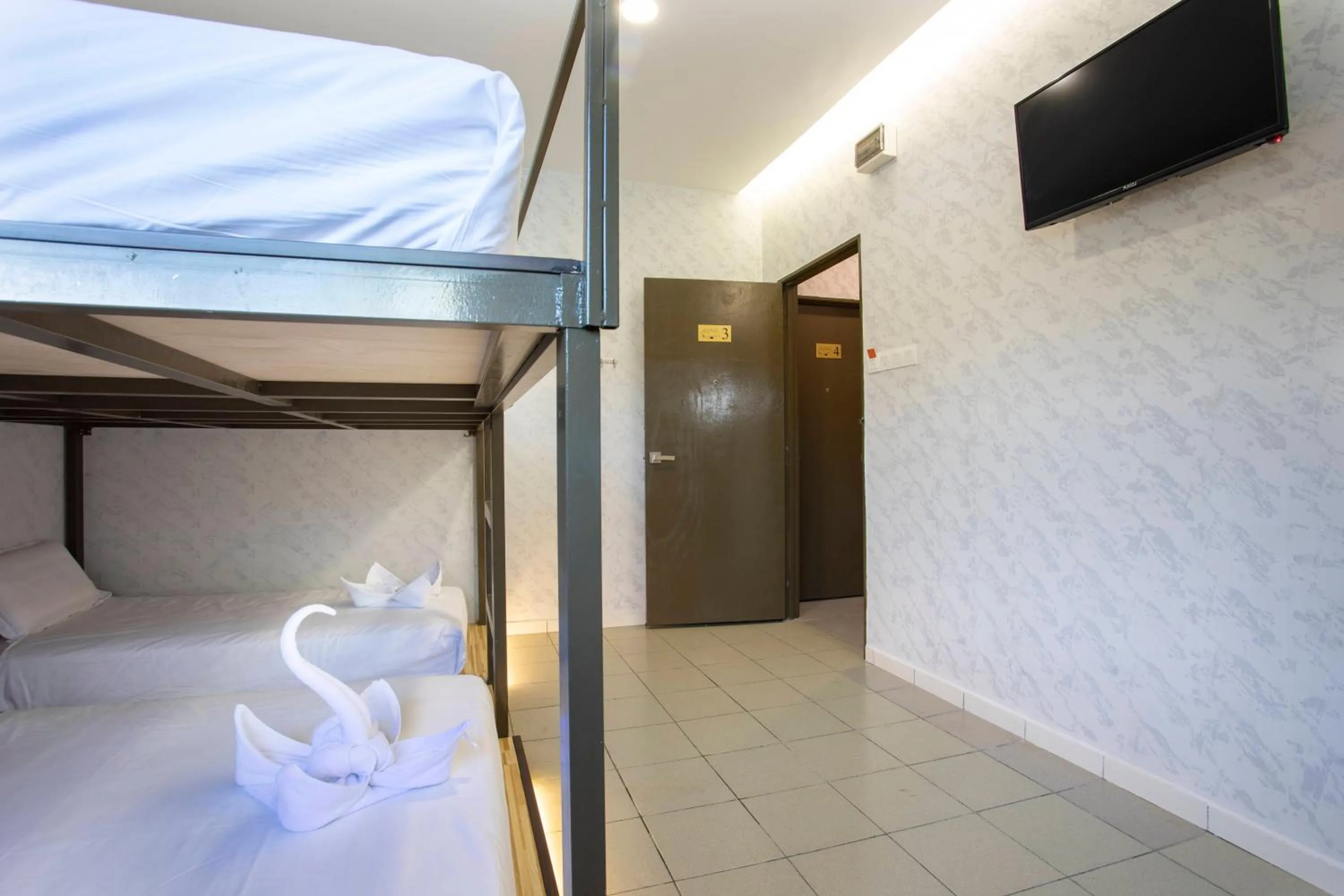 Bed in Lazy Cat Home At Gaya Street