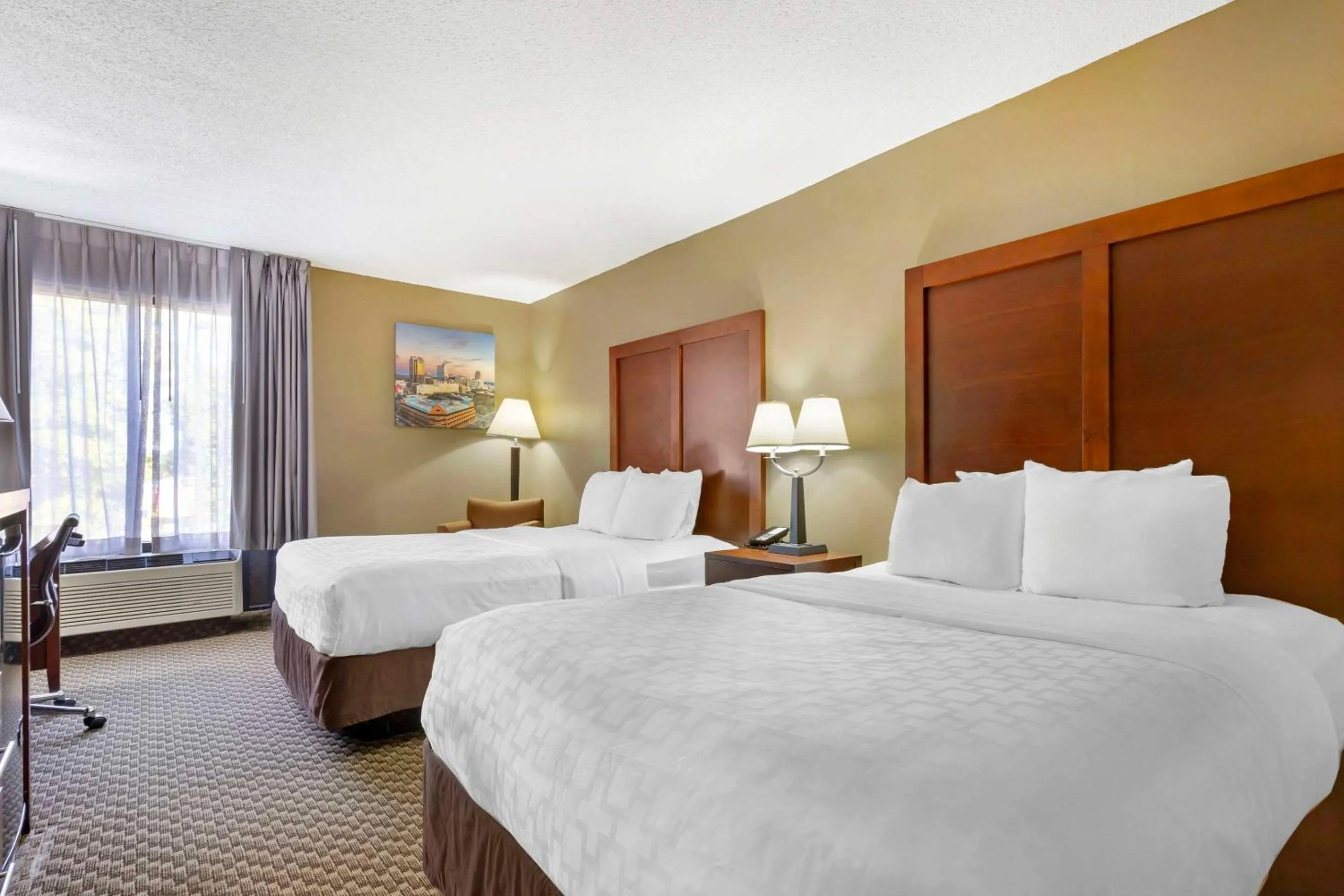 Bedroom, Bed in Clarion Pointe Durham Research Triangle Park