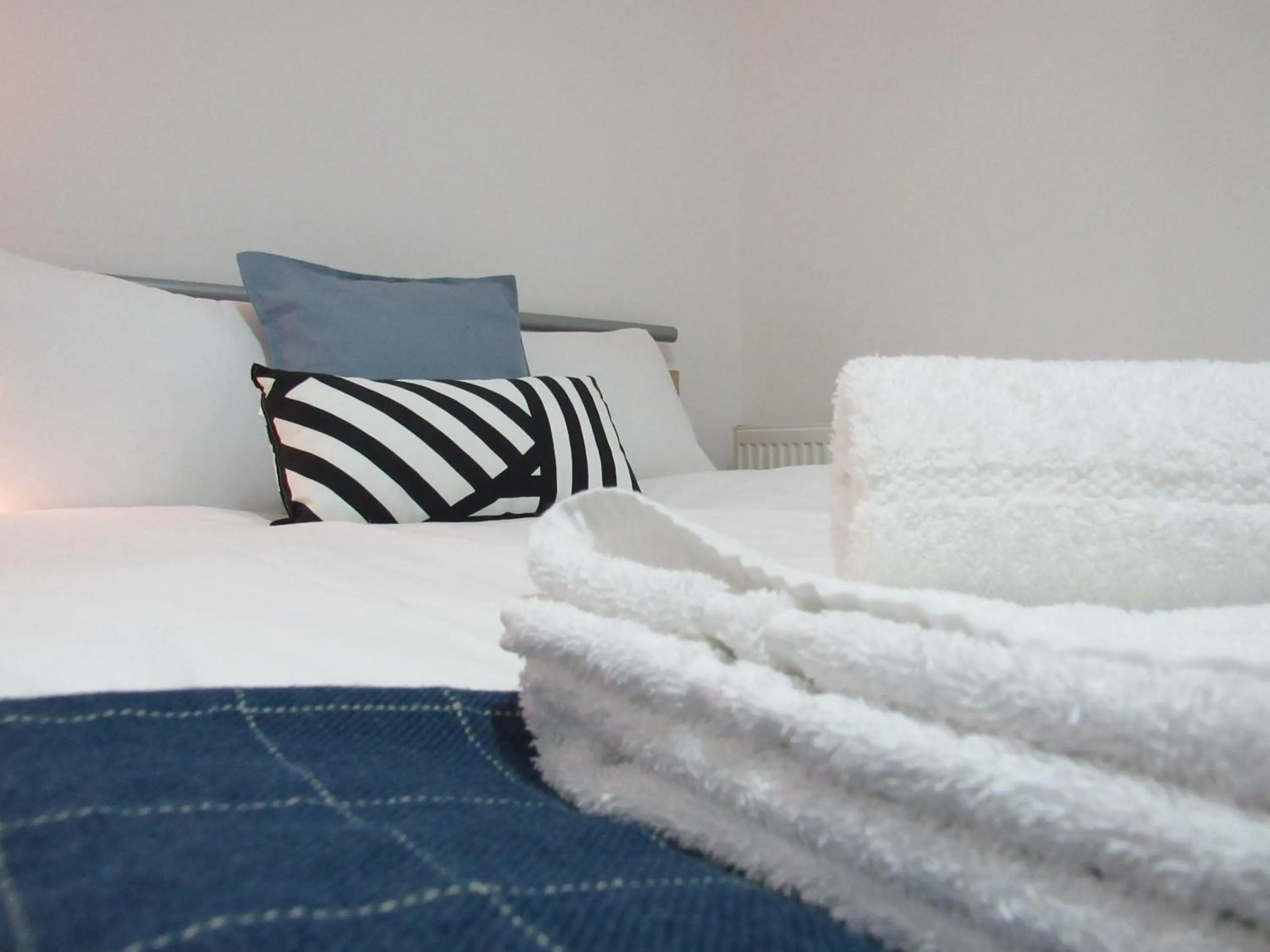 Bed in The Tas Suites - Tas Accommodations