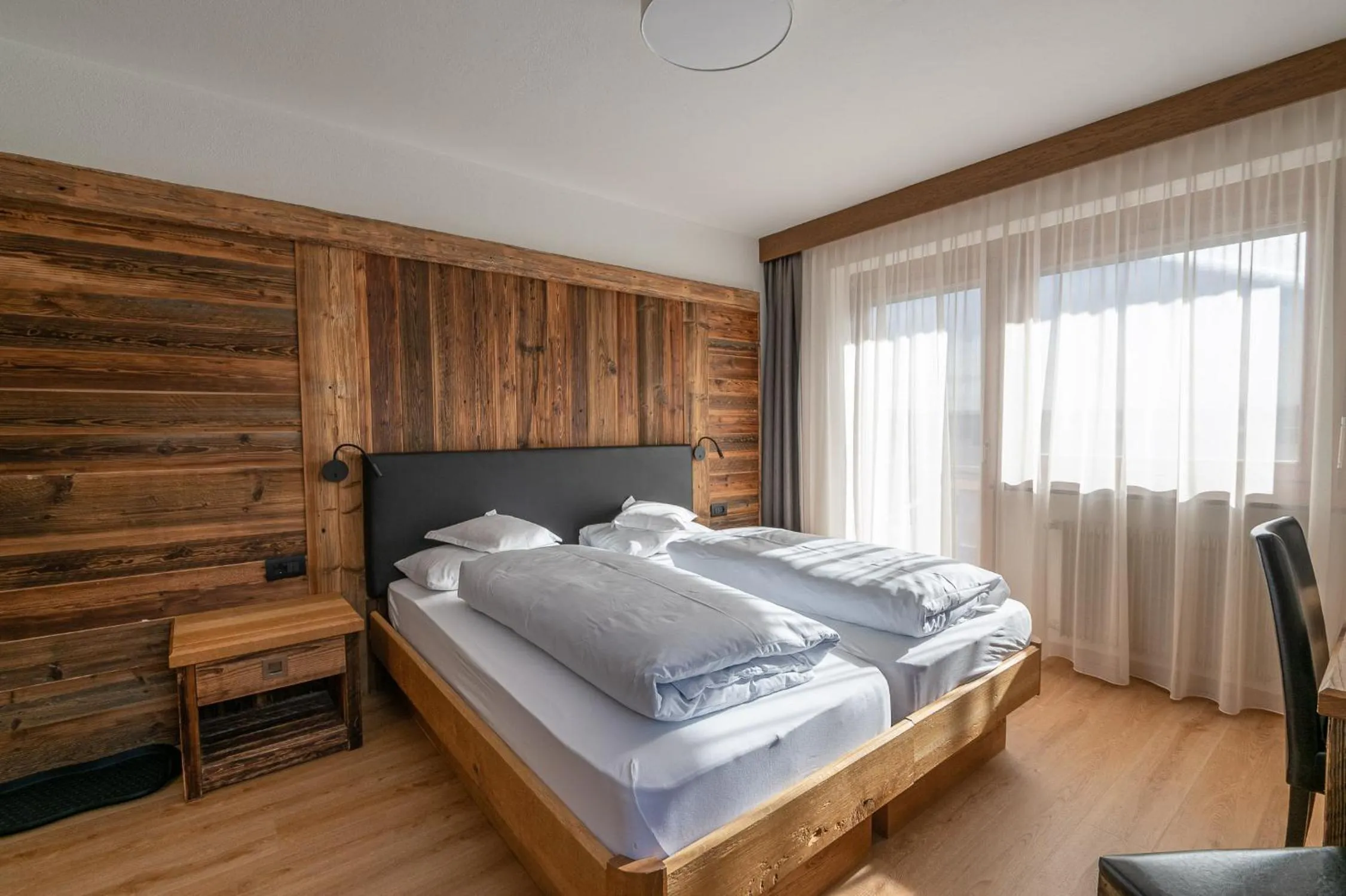 Bed in Garni Ciasa Tamà Sas di Pezzedi Eriberto e Neumair Hermine