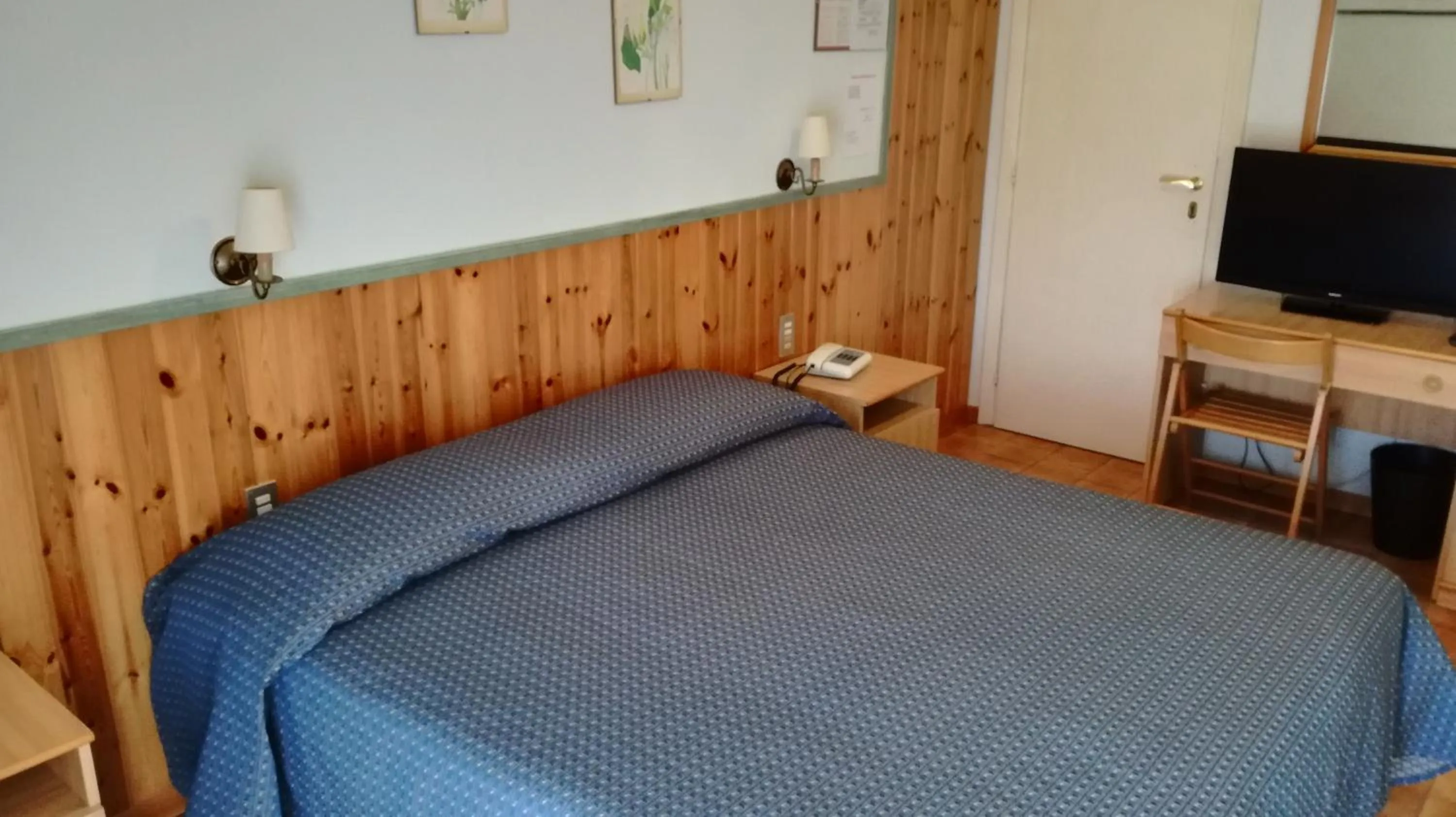 Bed in Albergo Le Rose