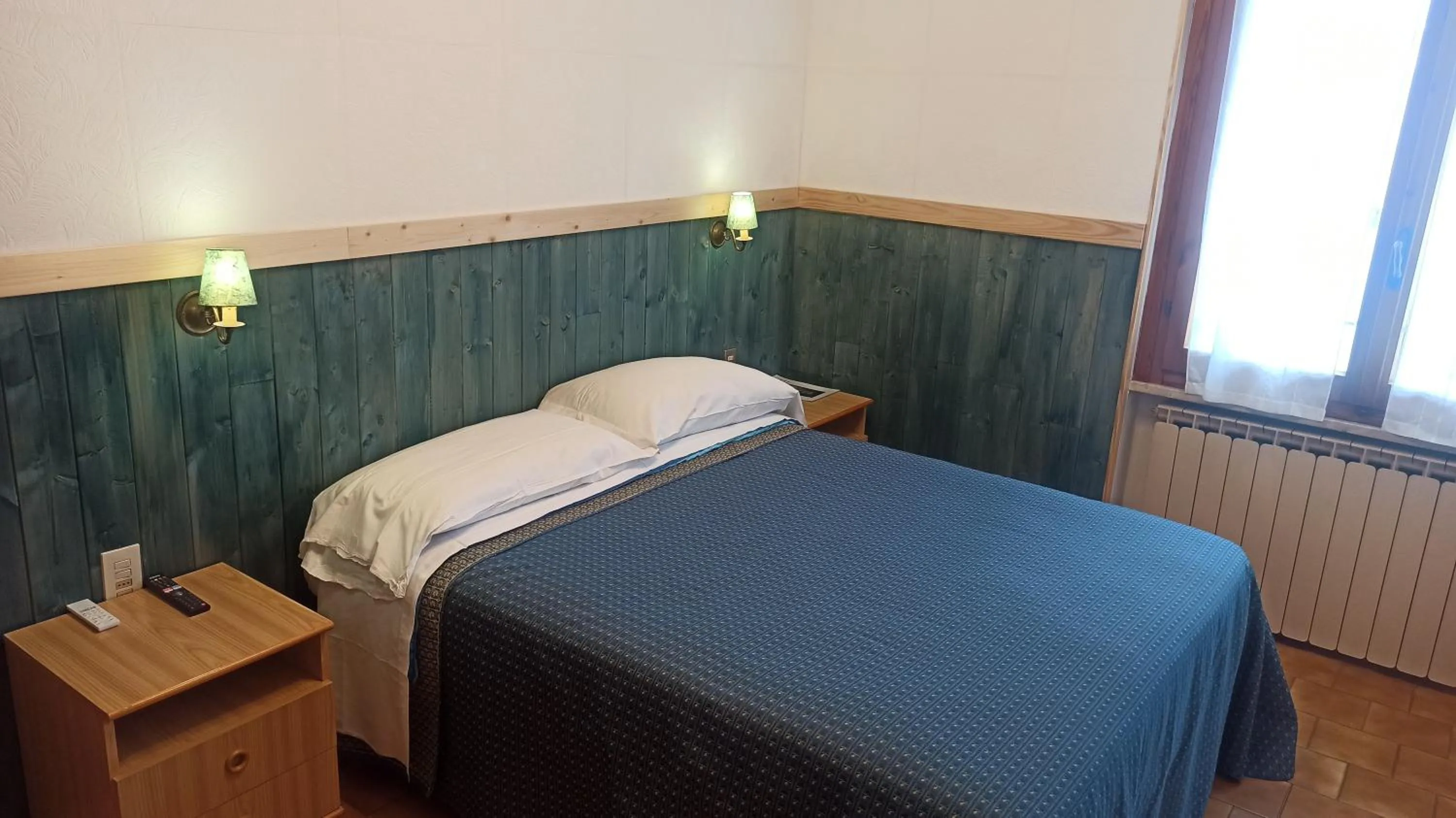 Bed in Albergo Le Rose