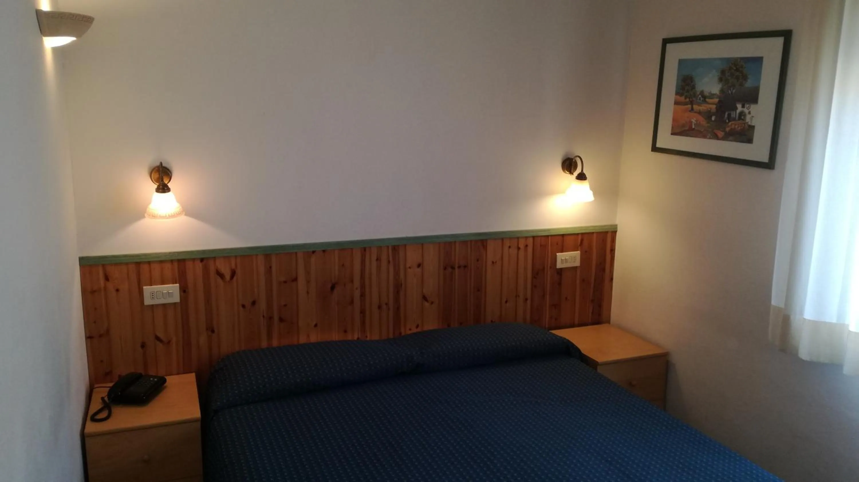 Bed in Albergo Le Rose