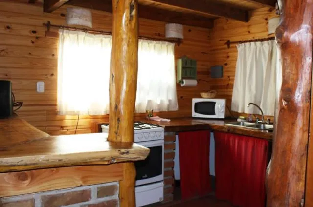 Kitchen or kitchenette in Cabañas Pichi Ruca
