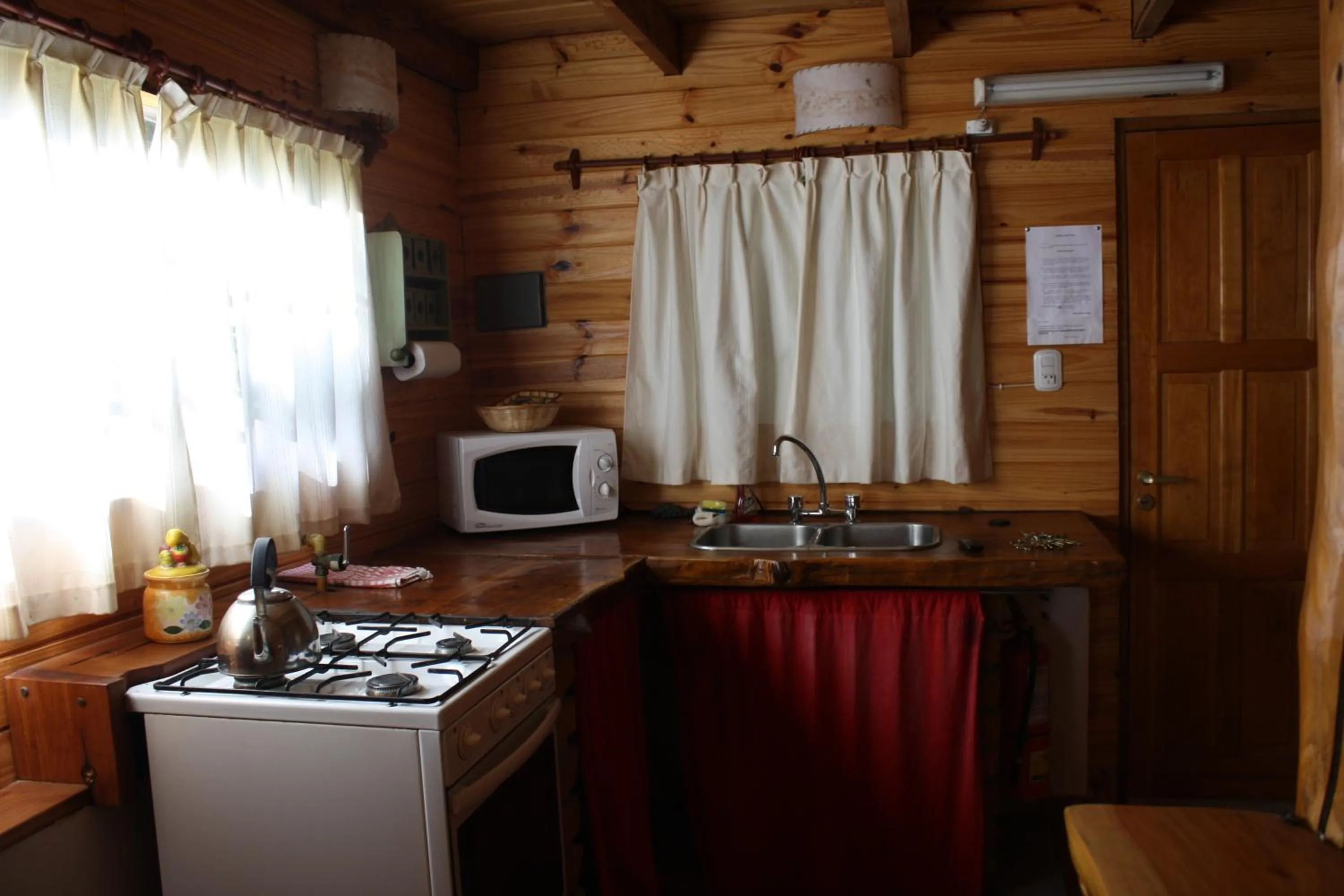 Kitchen or kitchenette in Cabañas Pichi Ruca