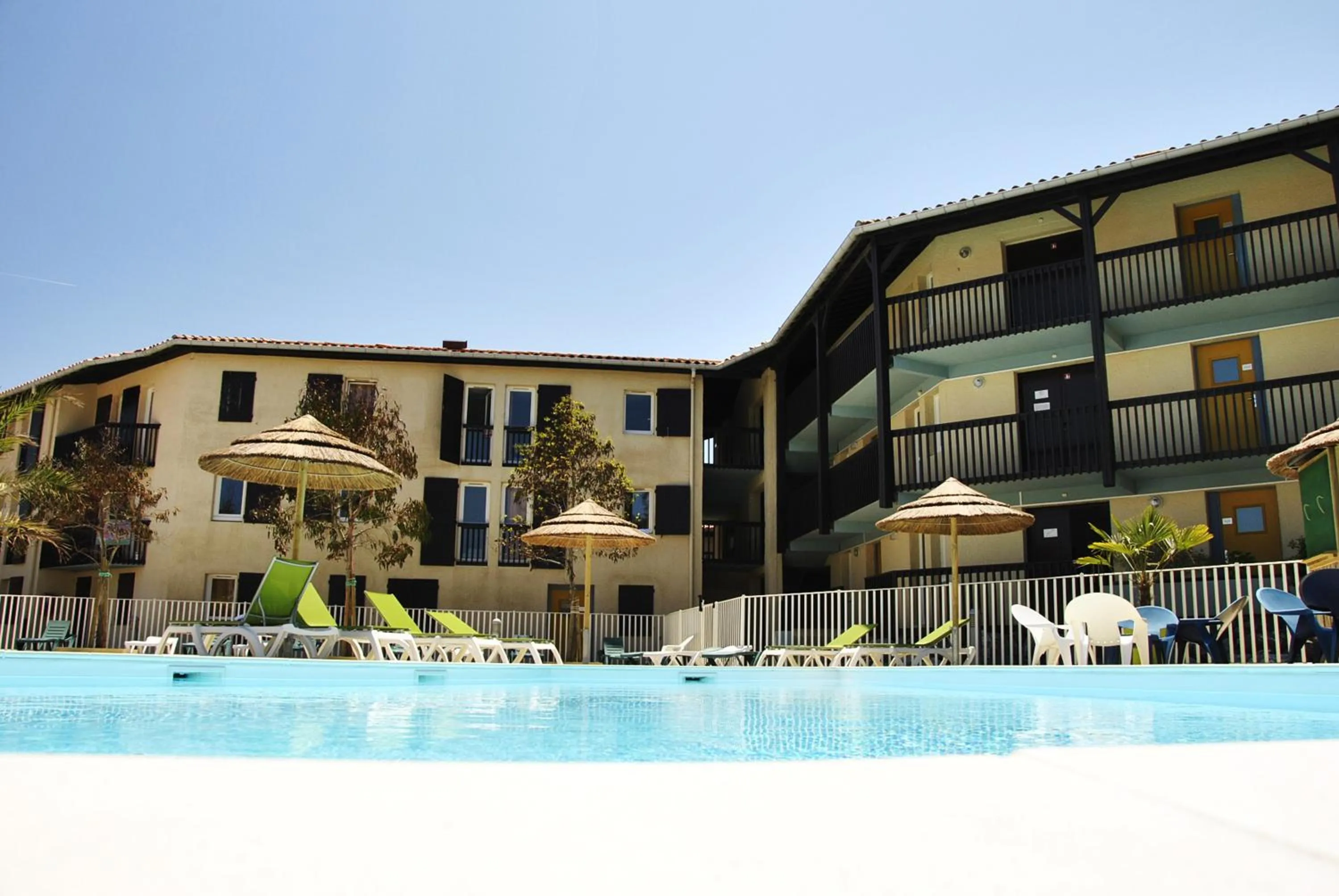 Swimming pool in Village Vacances Le Junka