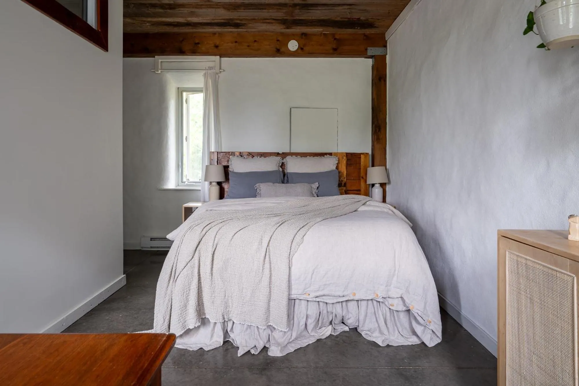 Bed in Owl's Nest Suites