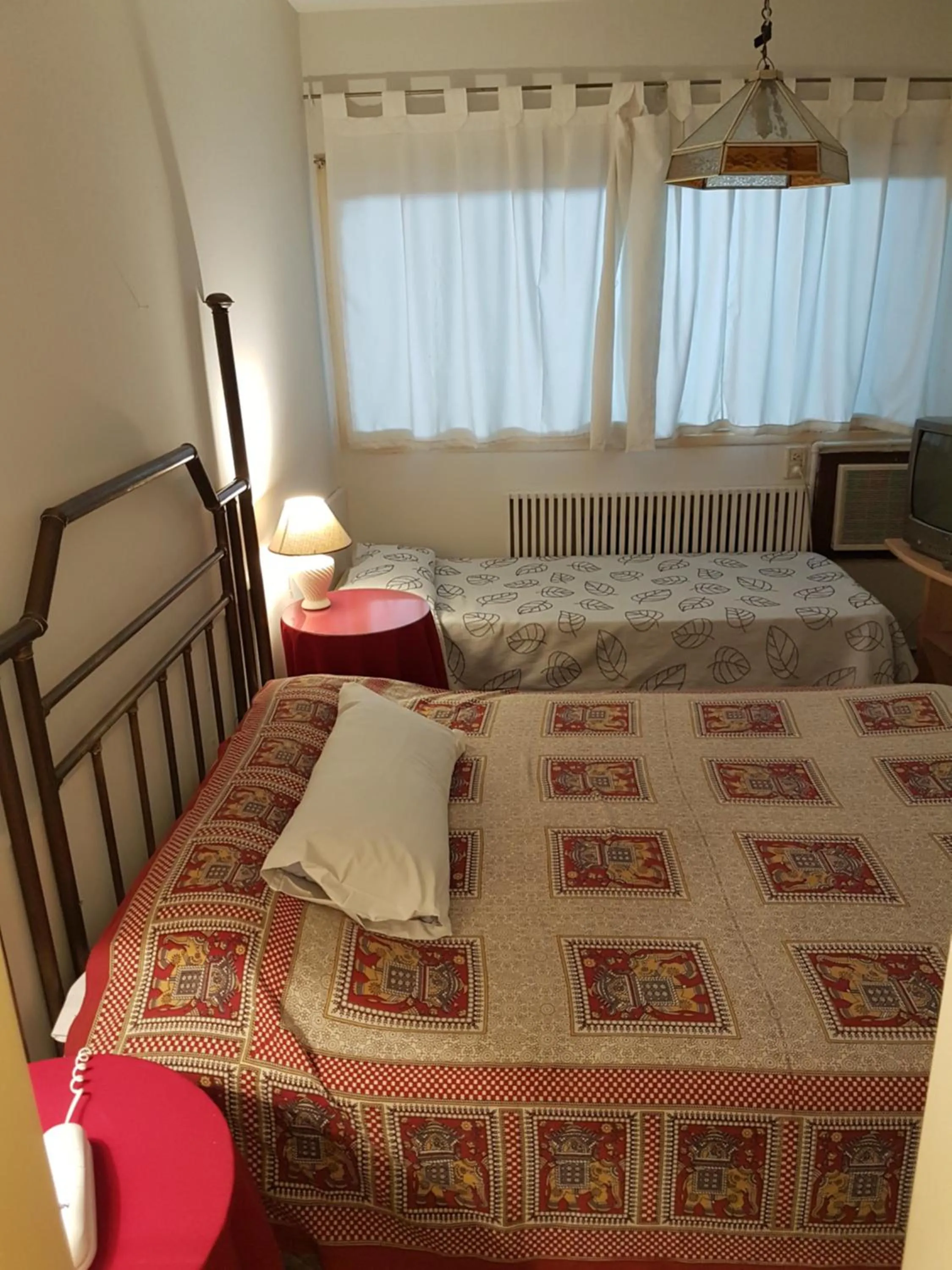 Photo of the whole room, Bed in Nuevo Castillo Hotel