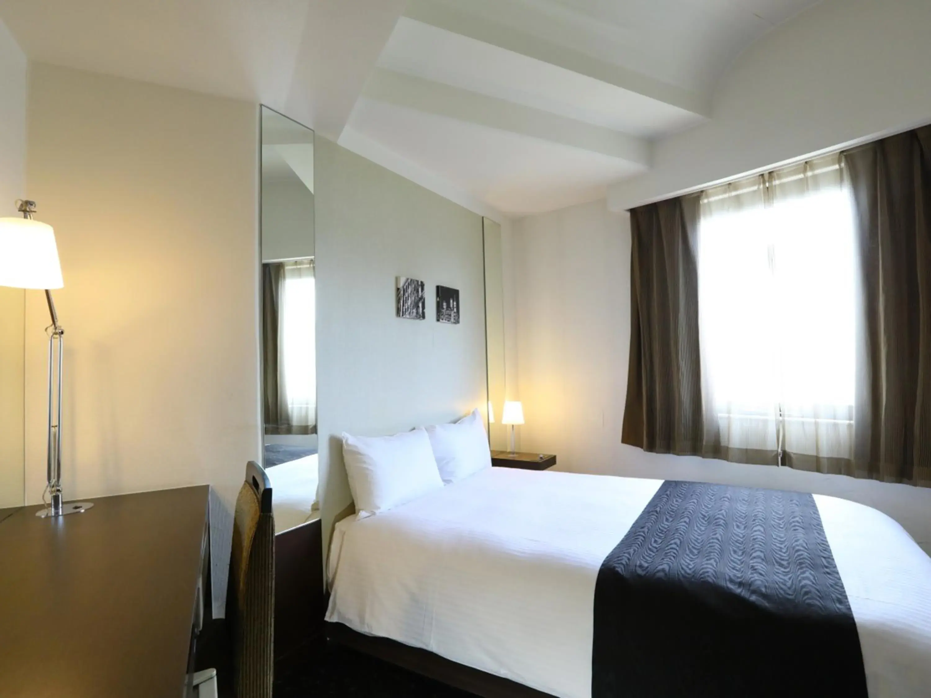 Photo of the whole room, Bed in APA Hotel Sagamihara Hashimoto Ekimae Photo of the whole room, Bed in APA Hotel Sagamihara Hashimoto Ekimae