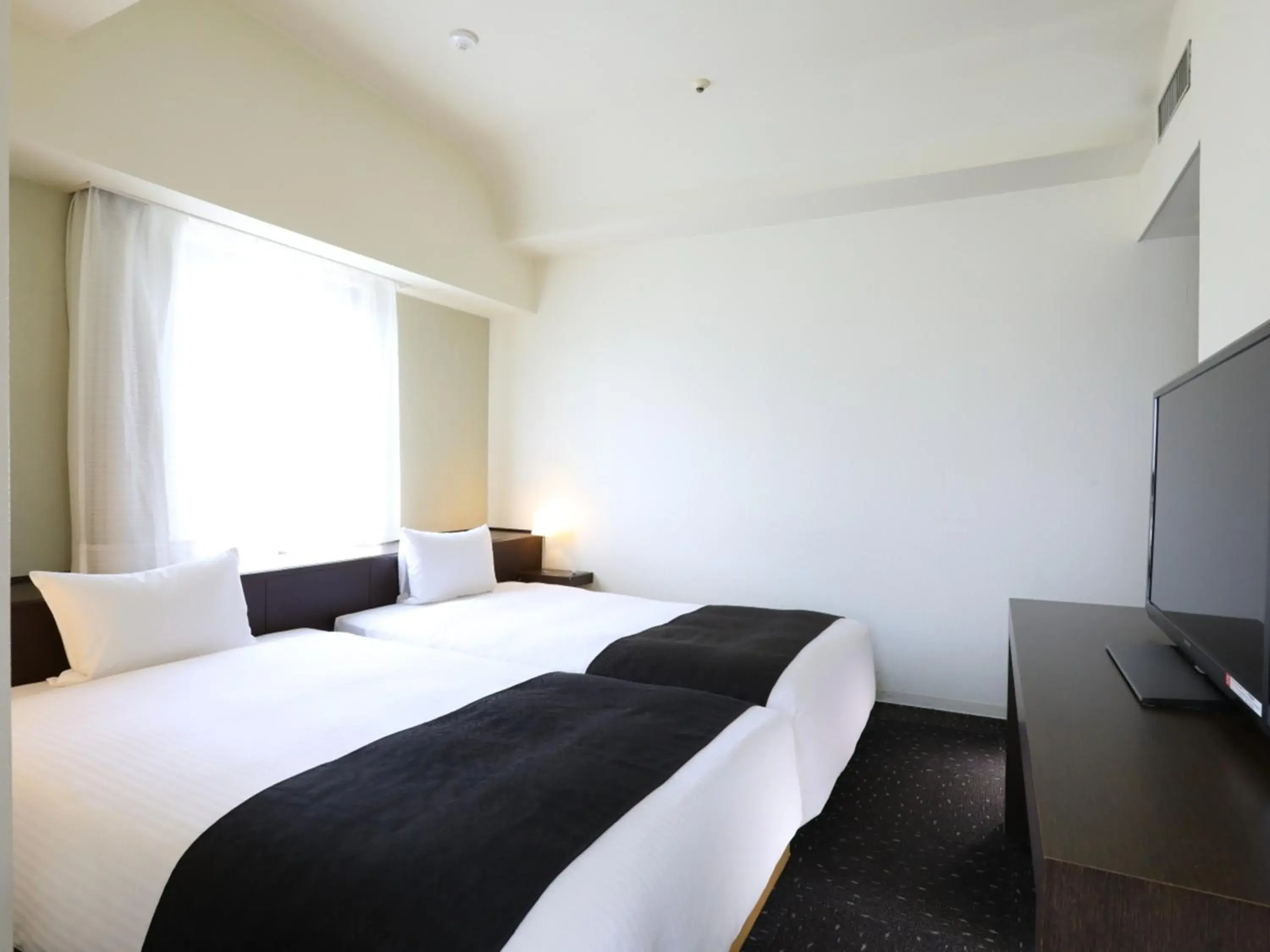 Photo of the whole room, Bed in APA Hotel Sagamihara Hashimoto Ekimae Photo of the whole room, Bed in APA Hotel Sagamihara Hashimoto Ekimae