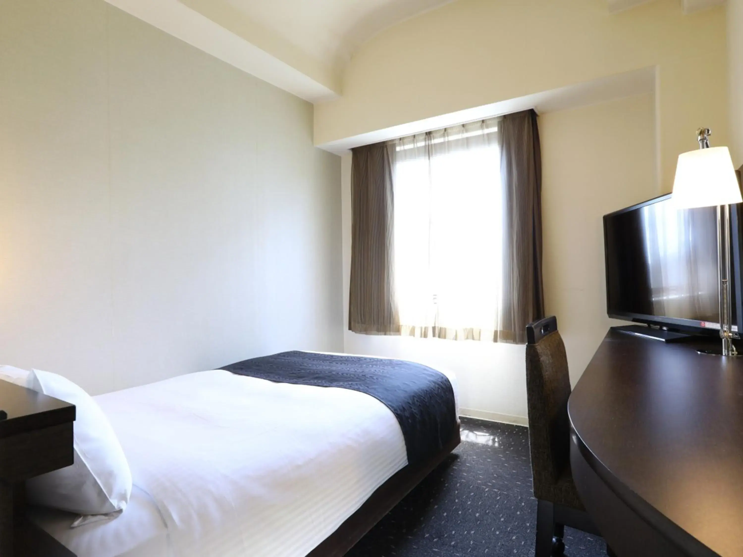 Photo of the whole room, Bed in APA Hotel Sagamihara Hashimoto Ekimae Photo of the whole room, Bed in APA Hotel Sagamihara Hashimoto Ekimae